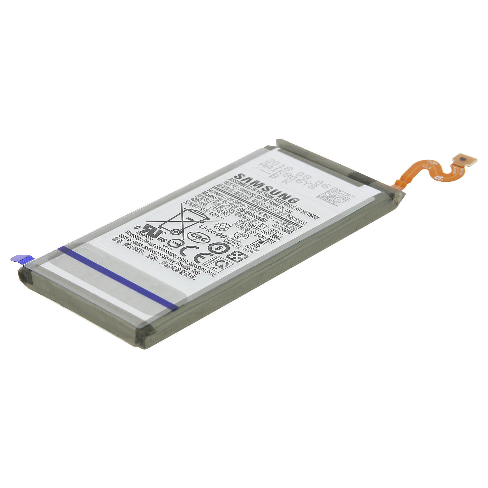 Une batterie avec du texte et un fil orange s'étendant du haut.