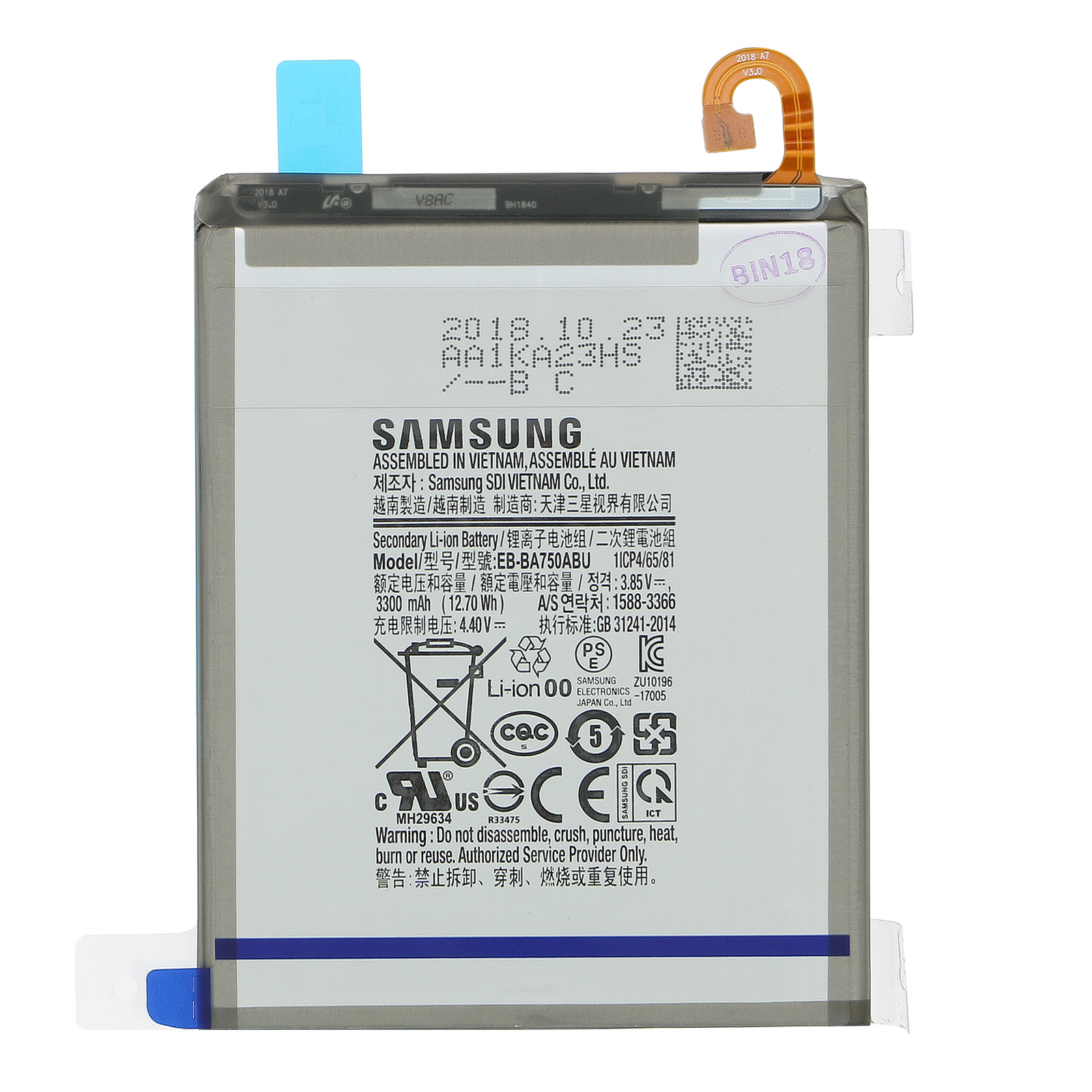 Una batteria per telefono Samsung. È grigia con testo nero. Ha un connettore blu e marrone. L'etichetta è visibile.