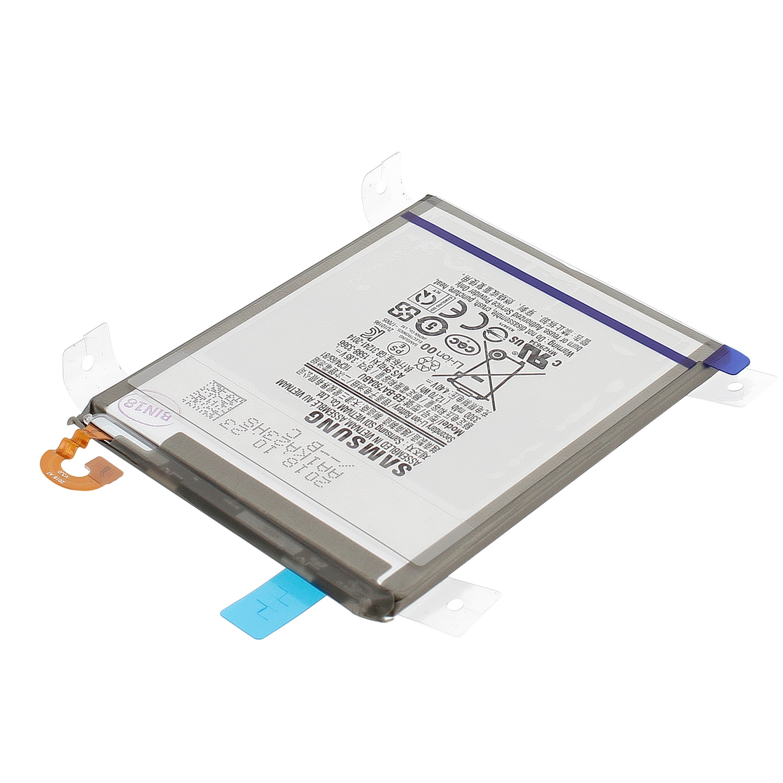 Batteria Samsung con cavo flessibile ed etichetta. È in un supporto di plastica.