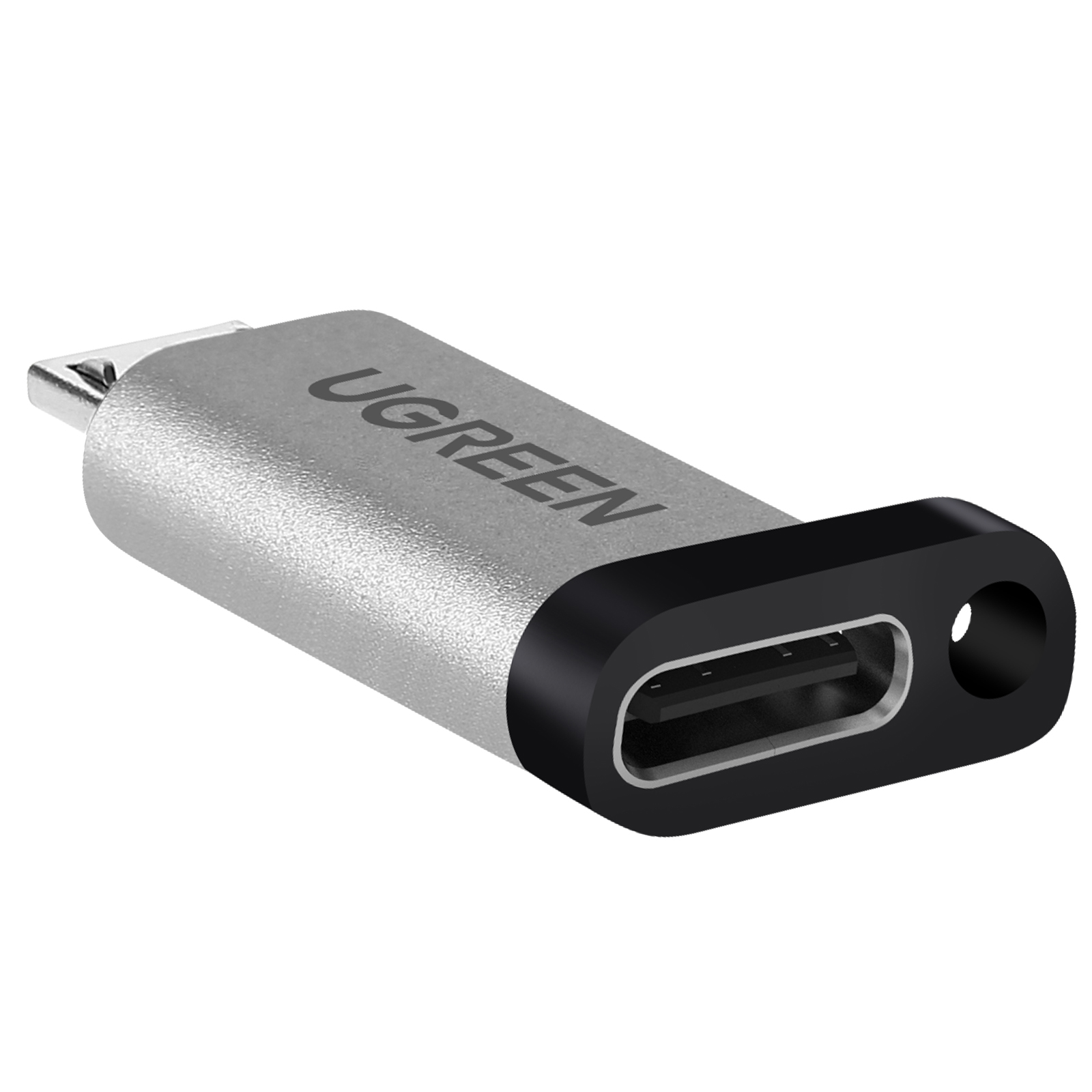 Srebrny adapter USB-C UGREEN z czarnym portem USB-C, lekko pod kątem.
