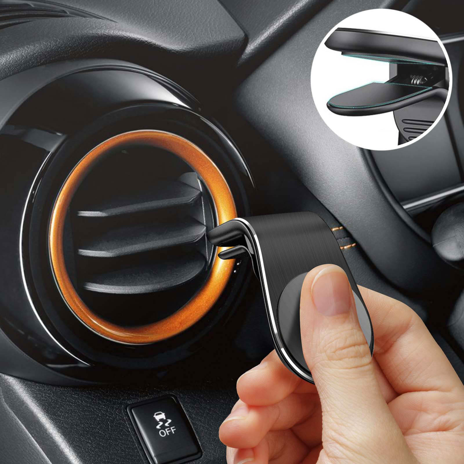 Hand hält eine Lüfterhalterung für das Auto. Die Halterung ist schwarz und silber. Der Lüfter des Autos ist sichtbar.