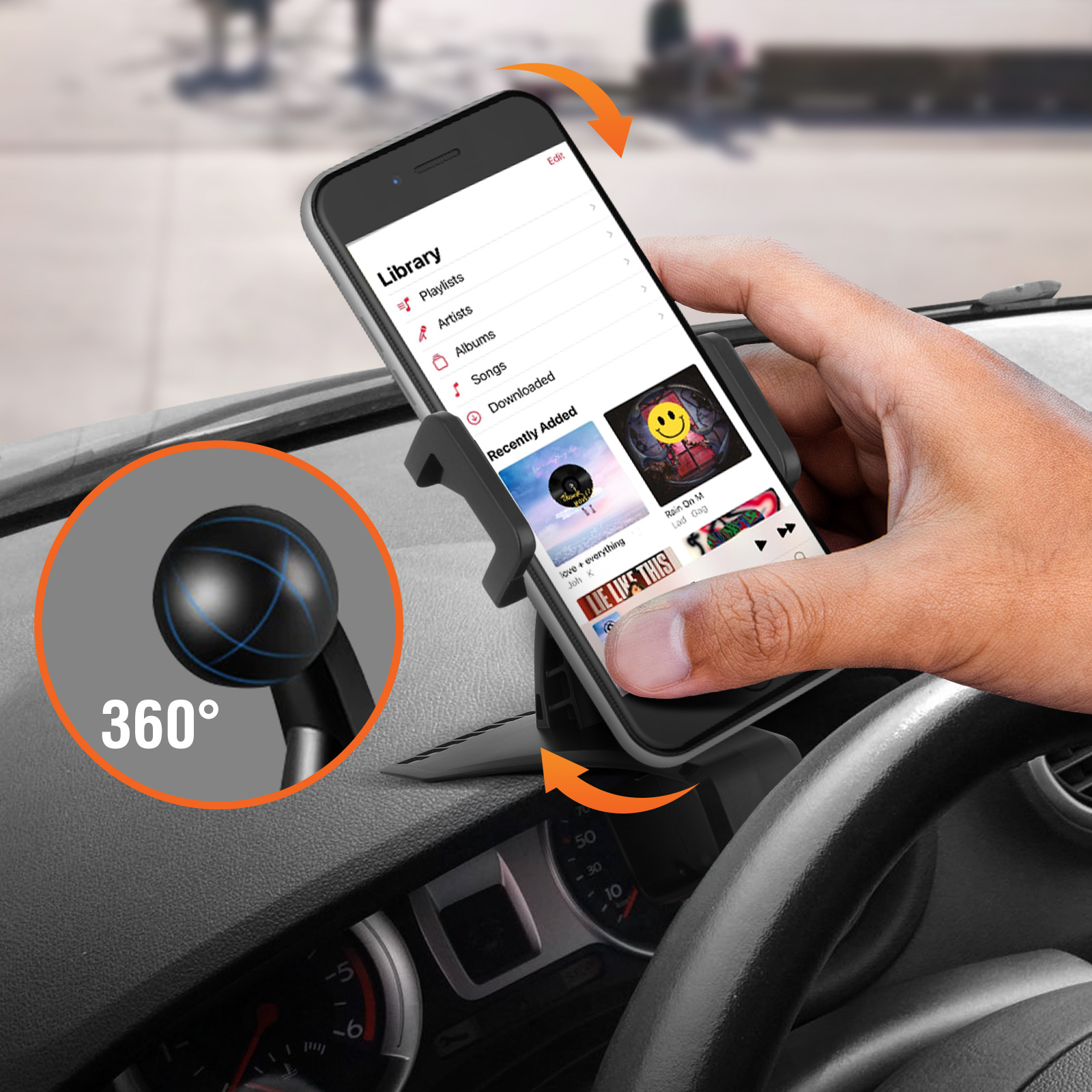 Una mano tiene un telefono in un'auto. Il telefono mostra l'app musicale. Rotazione a 360 gradi.