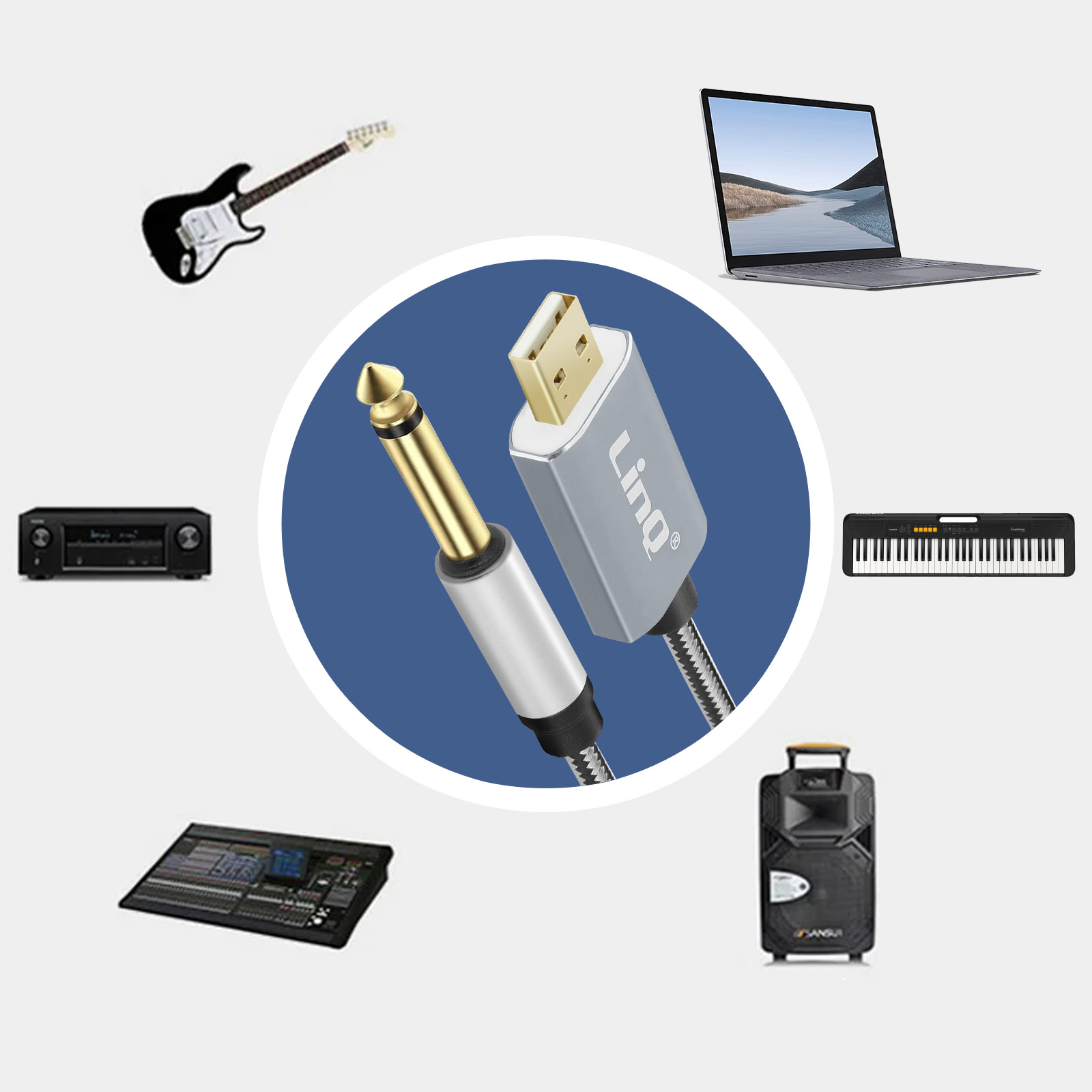 Un cable jack, guitarra, portátil, teclado, mezclador y altavoz sobre superficie azul.