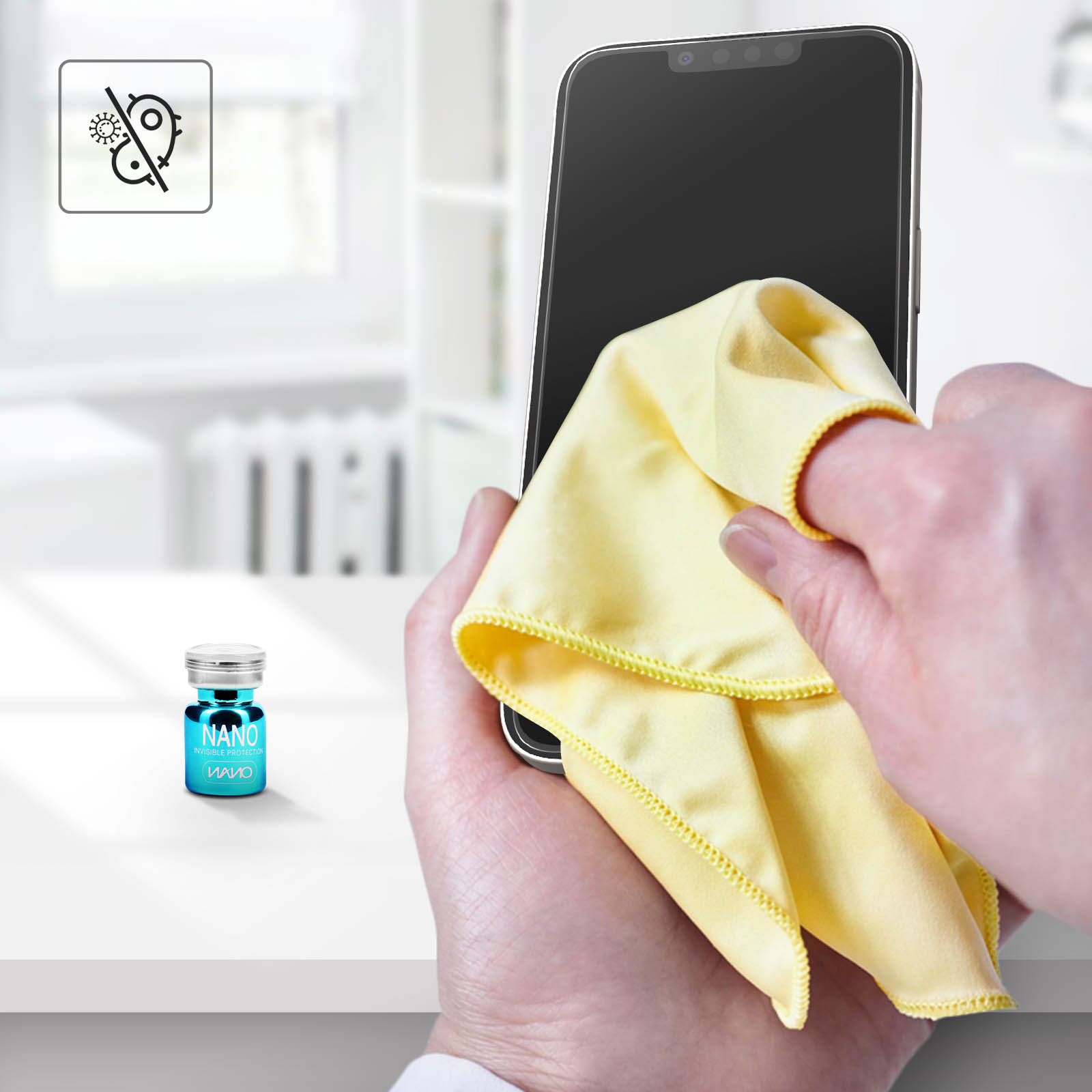 Una persona sta pulendo lo schermo di un telefono con un panno giallo. È presente una bottiglia di liquido nanorivestimento.