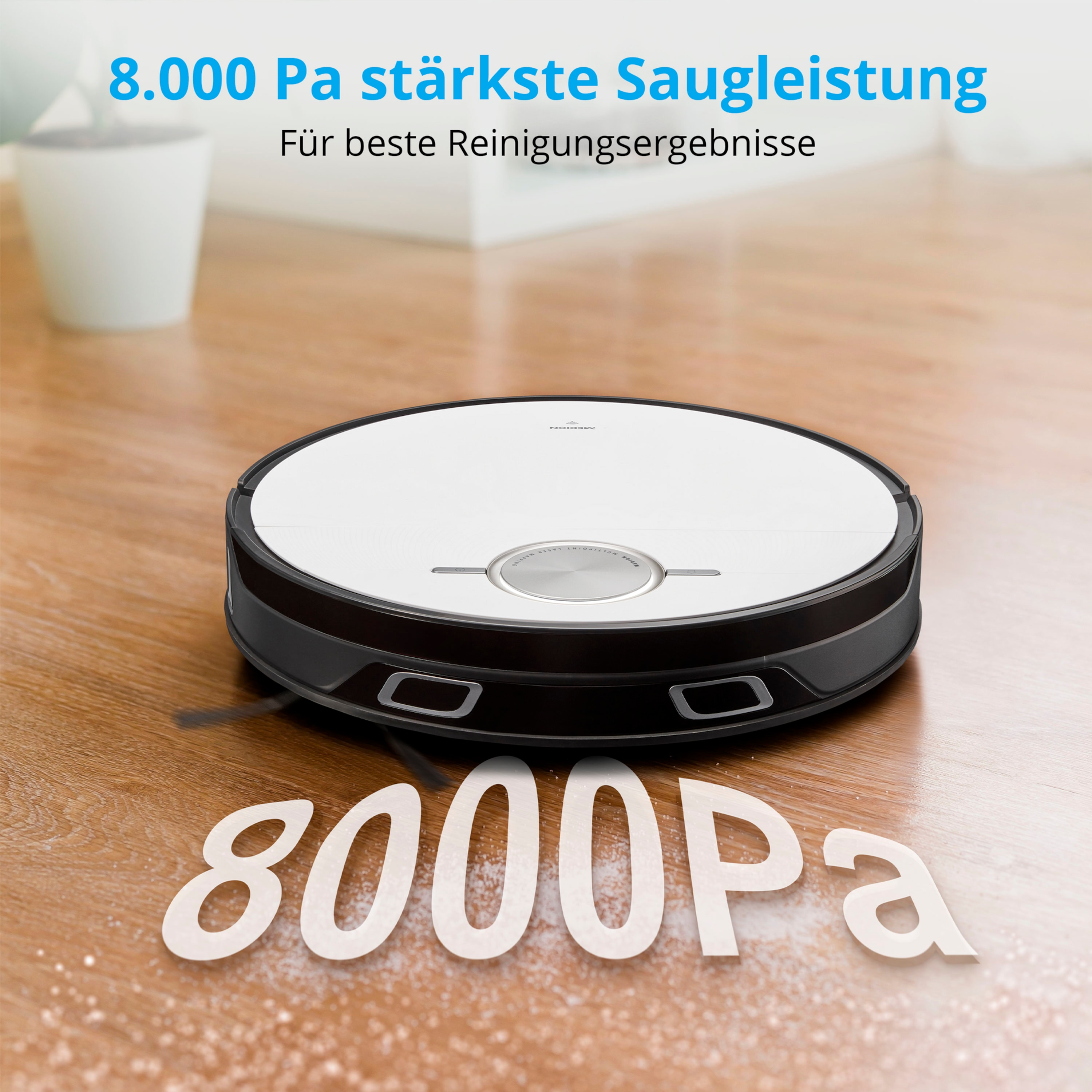 Odkurzacz robot na drewnianej podłodze. Widoczny tekst i logo.