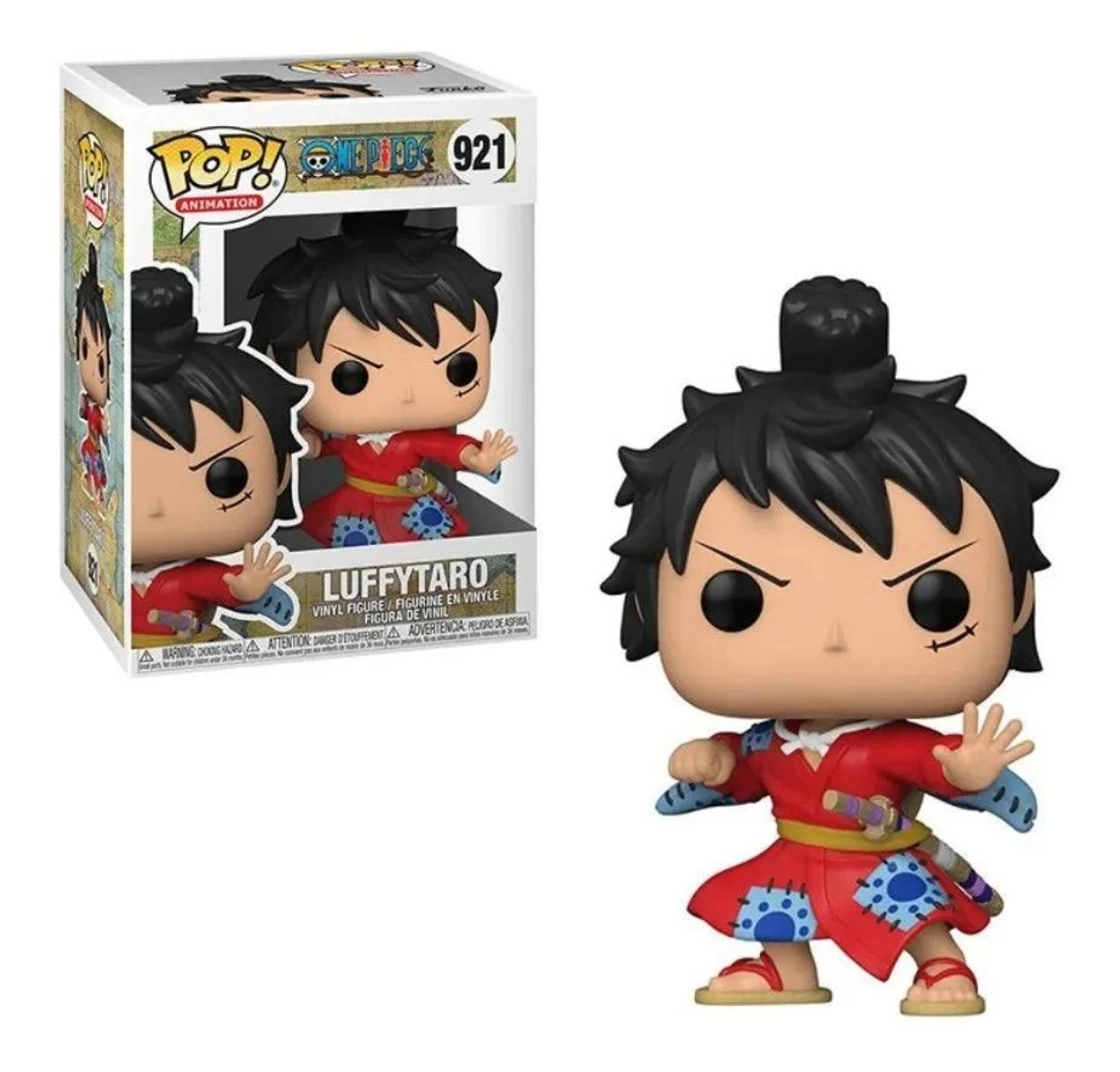 Figurina Funko Pop di Luffy in abito rosso di One Piece, accanto alla scatola in cui è arrivata.