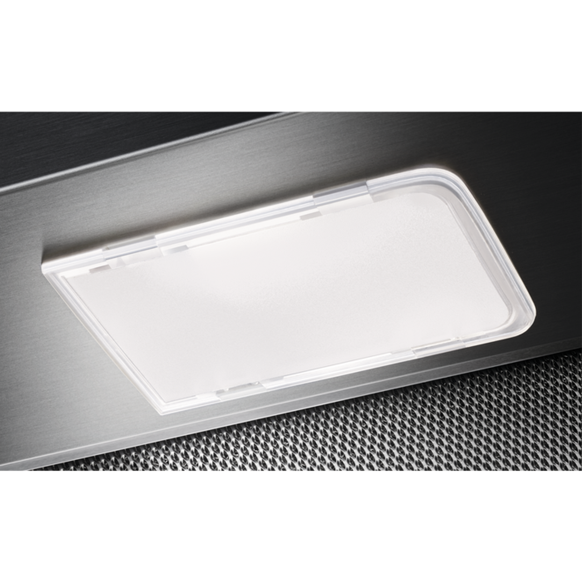 Primo piano di un apparecchio di illuminazione bianco rettangolare.