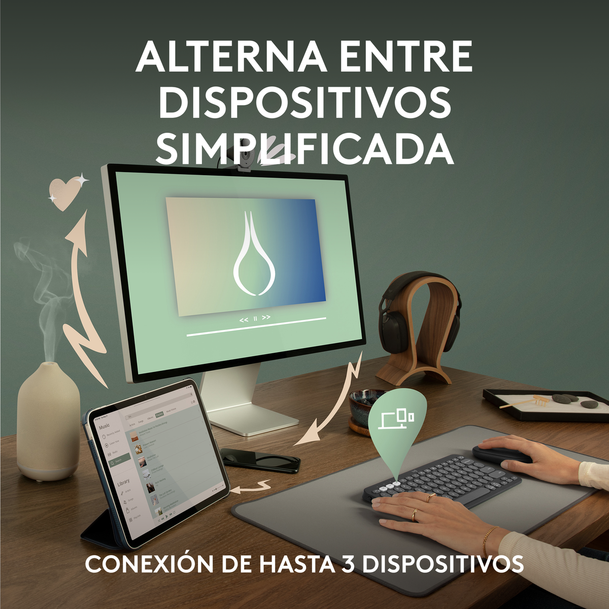 Konfiguracja biurka z monitorem, tabletem, klawiaturą, myszą i dyfuzorem, z tekstem.