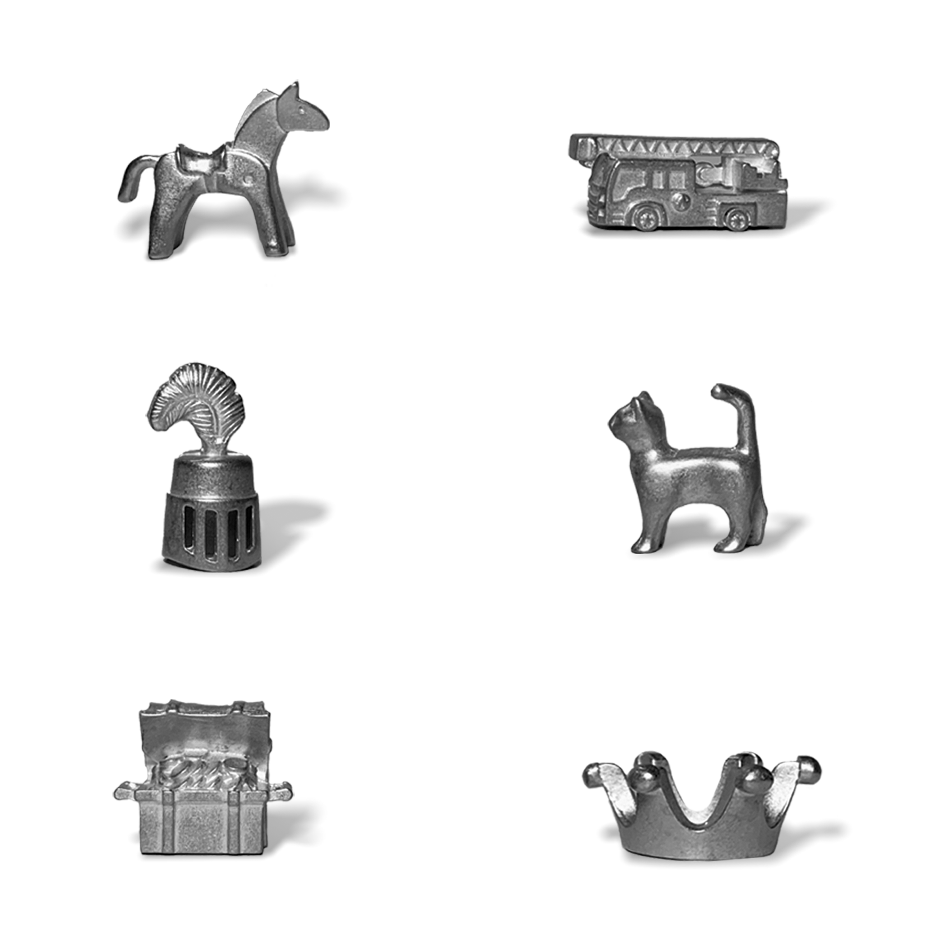 Monopoly-Spielfiguren: Pferd, Feuerwehrwagen, Schiff, Katze, Nadelhut und Krone.