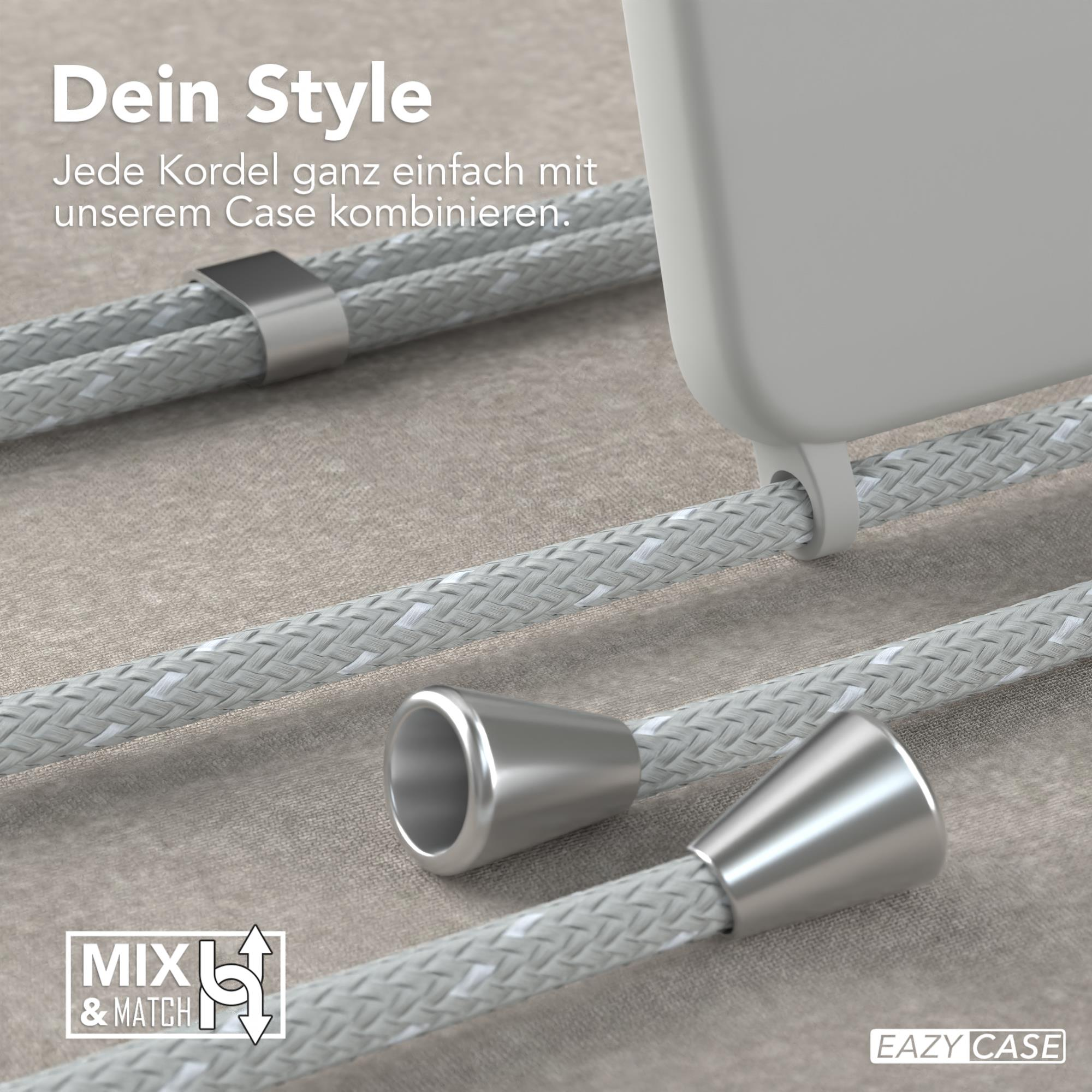 Nahaufnahme einer Handyhülle mit Kordel und Metalldetails.