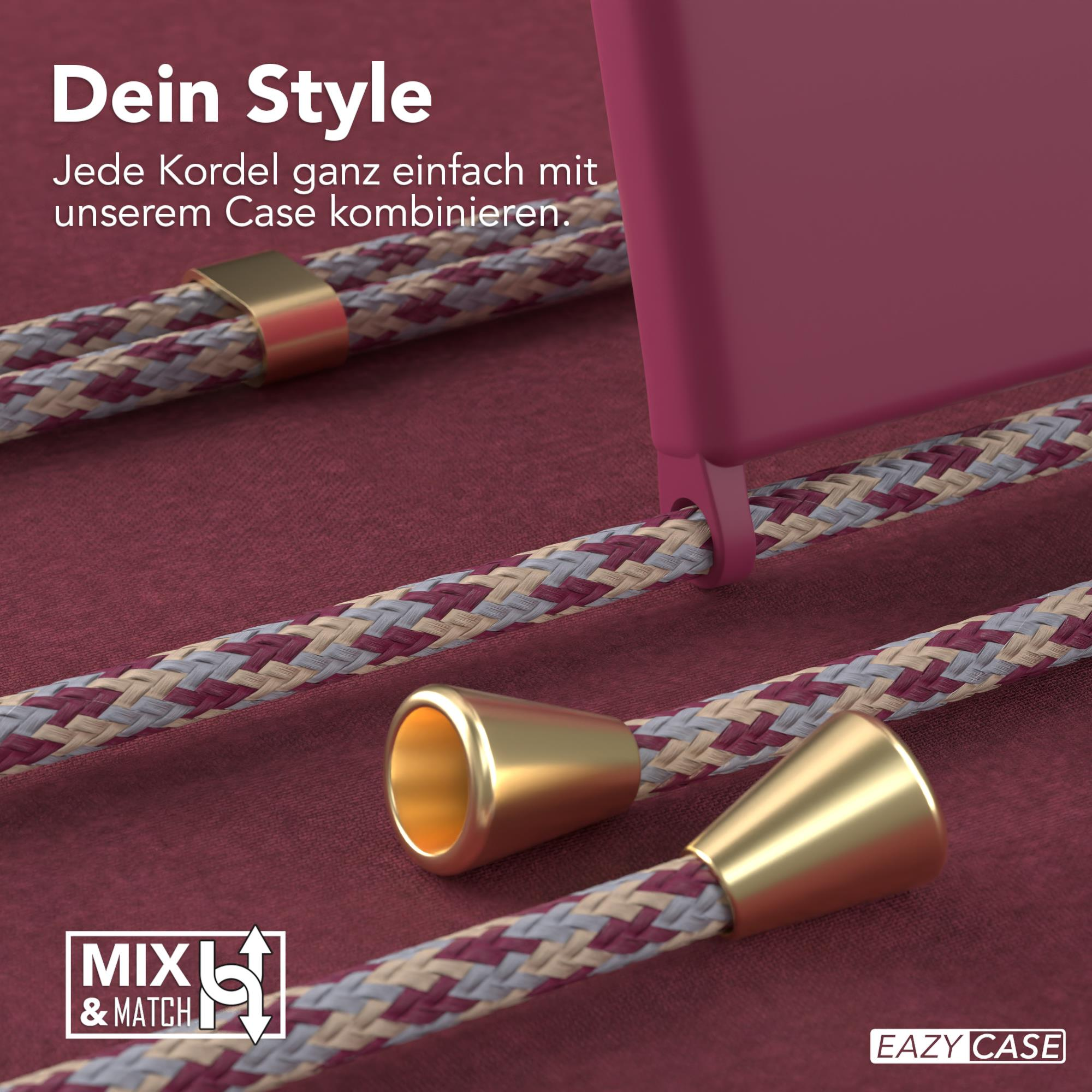 Nahaufnahme einer Handyhülle mit Schlüsselband. Burgunderroter Hintergrund mit goldenen Akzenten.