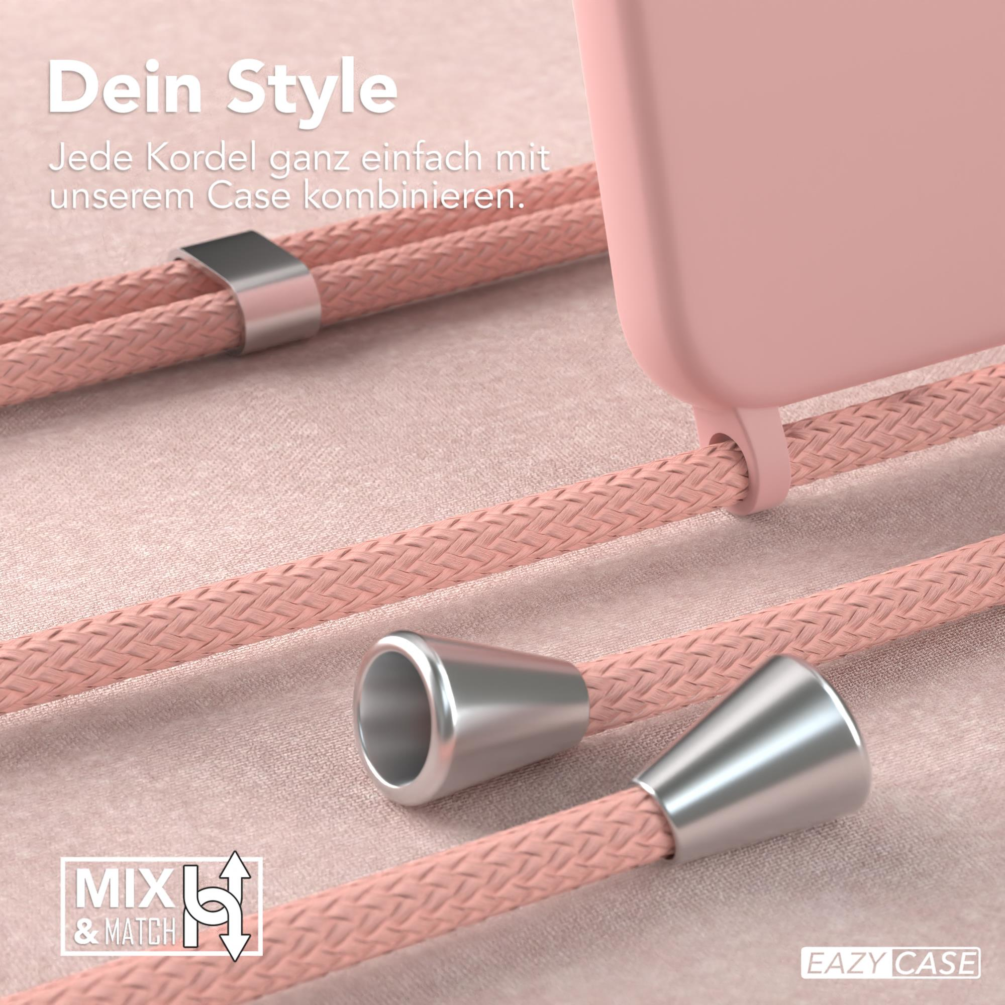 Nahaufnahme einer rosa Handyhülle mit passendem Kordel und silberfarbenen Aufsätzen. Text sagt Mix & Match.