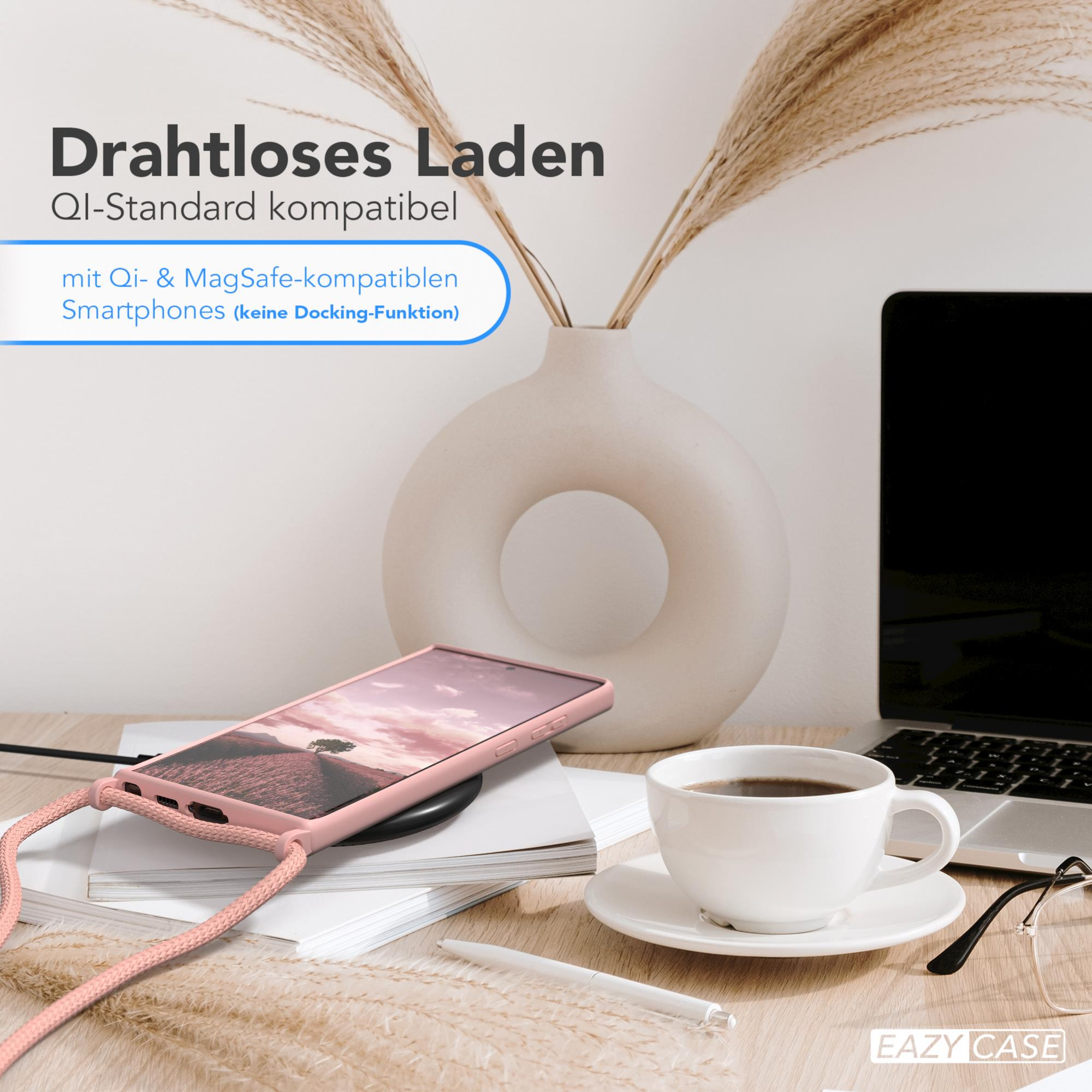 Ein Telefon auf einem kabellosen Ladegerät, neben einem Kaffee, mit Text: kabelloses Laden, Qi-Standard-kompatibel.