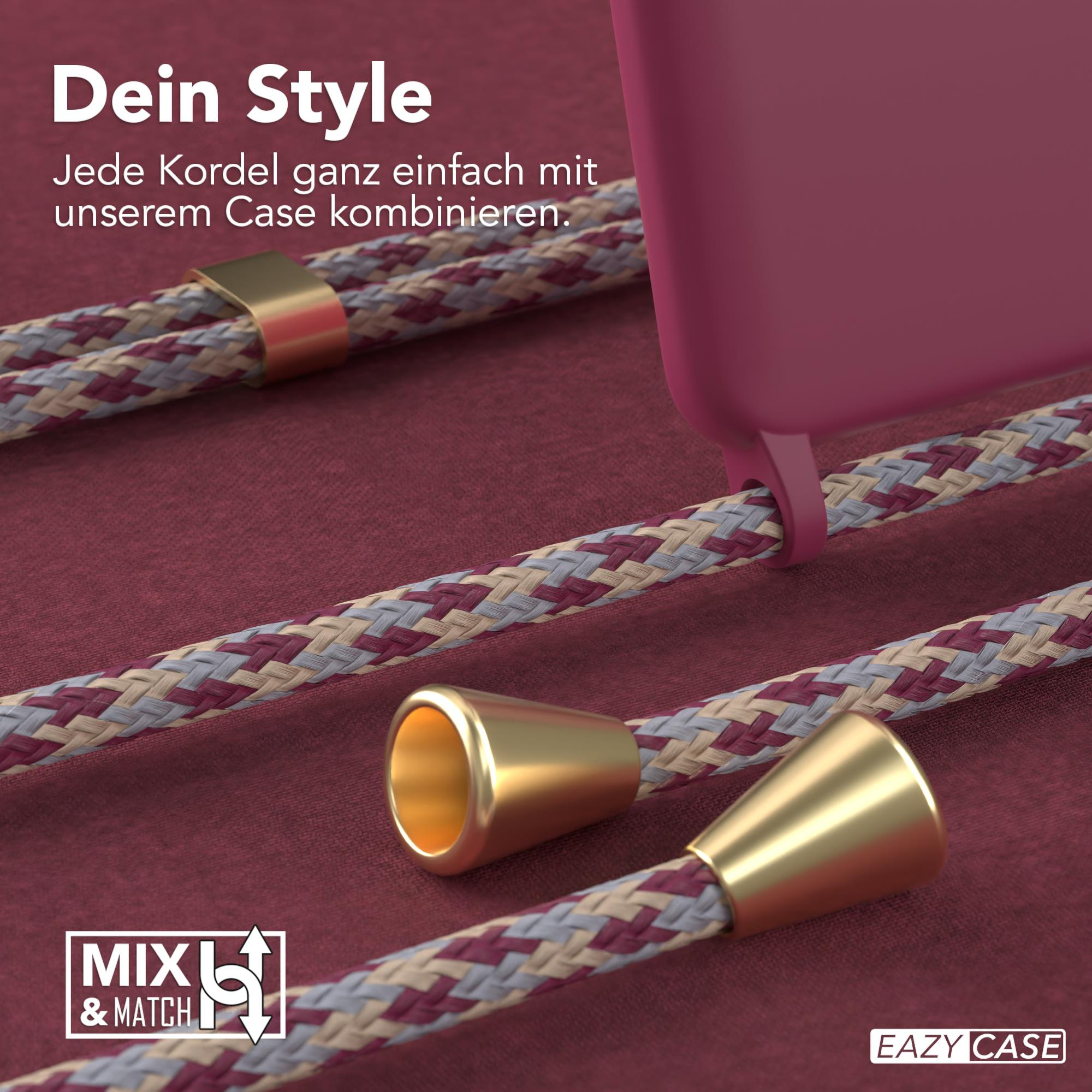 Nahaufnahme von Handyhülle und Kordel. Golddetails, rote Hülle. Text: einfach mit unserer Hülle kombinieren.