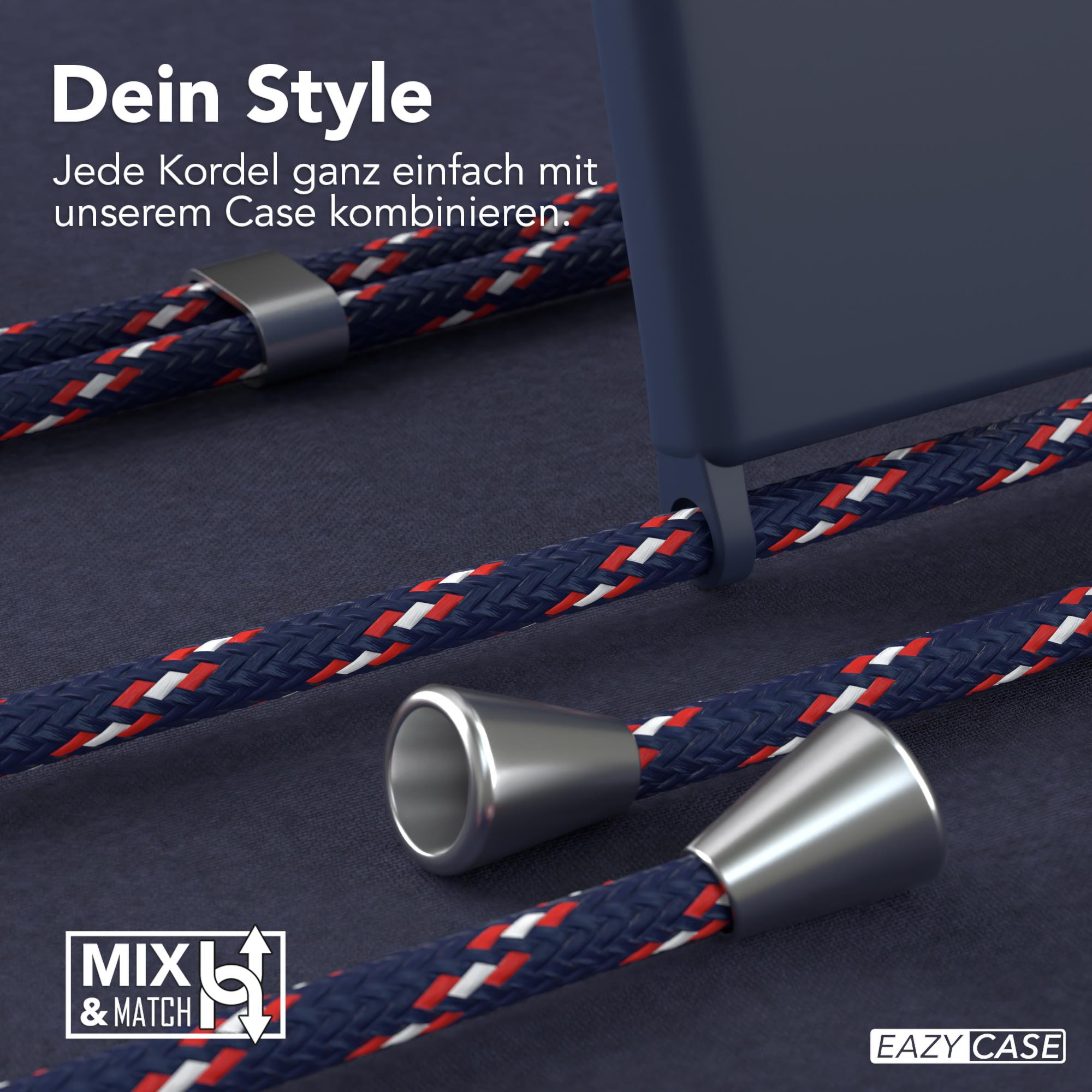 Nahaufnahme einer Handyhülle mit blau-, rot- und weiß geflochtenen Kordeln, Metallakzenten und dunklem Hintergrund.
