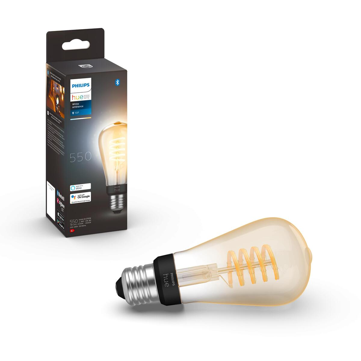Żarówka Philips Hue w pudełku i poza nim, z żarnikiem w stylu Edisona.