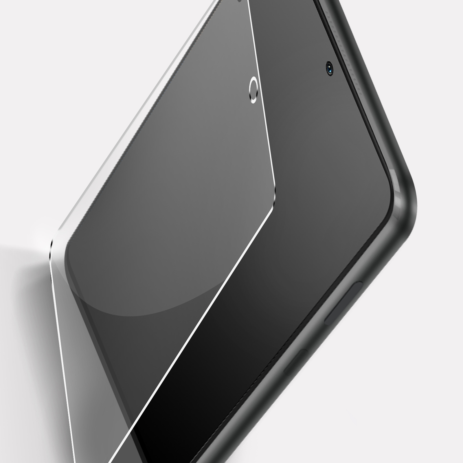 Uno smartphone con una protezione schermo parzialmente staccata. Il telefono è nero, la protezione trasparente.