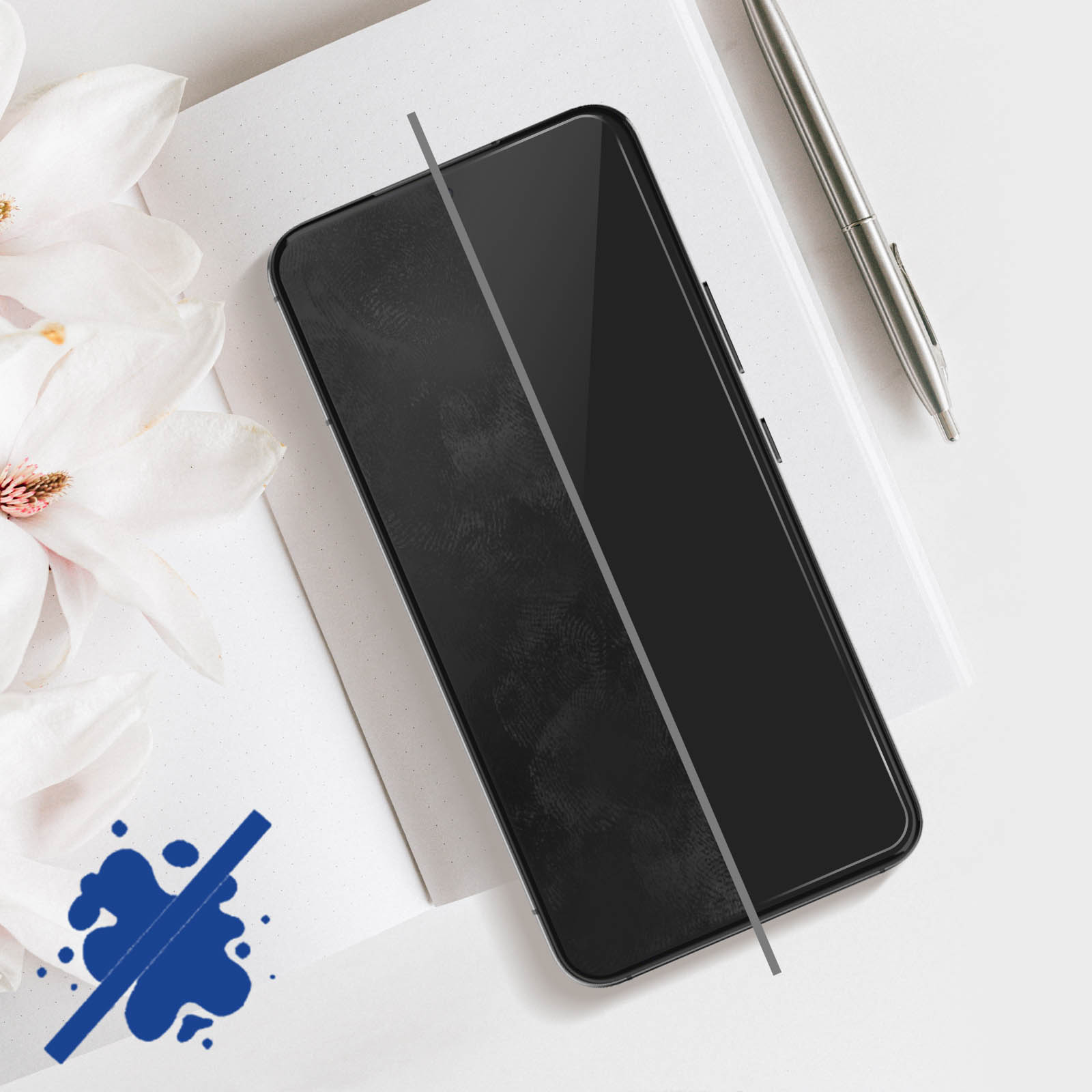 Telefon na notatniku z długopisem. Na ekranie jest narysowana linia. Pokazana jest ikona rozprysku.