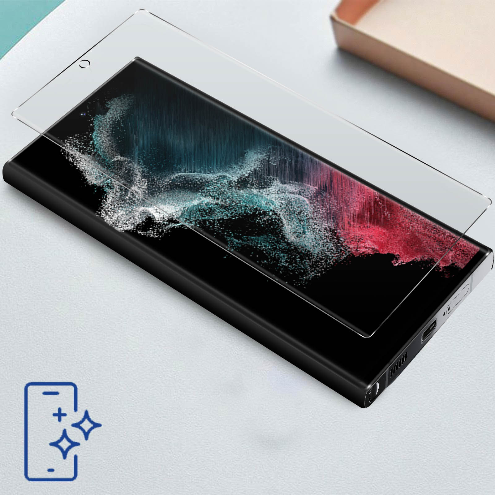 Telefon z nałożoną folią ochronną na ekran. Ekran ma kolorową sztukę abstrakcyjną. Ikona czyszczenia znajduje się w rogu.