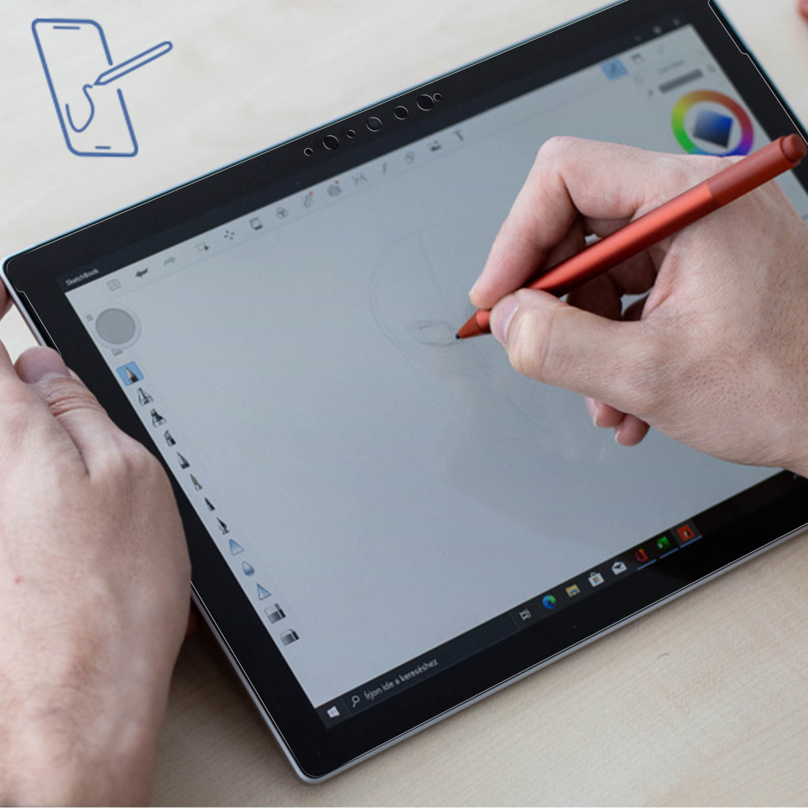 Osoba rysuje na tablecie czerwonym rysikiem. Otwarta aplikacja do rysowania.