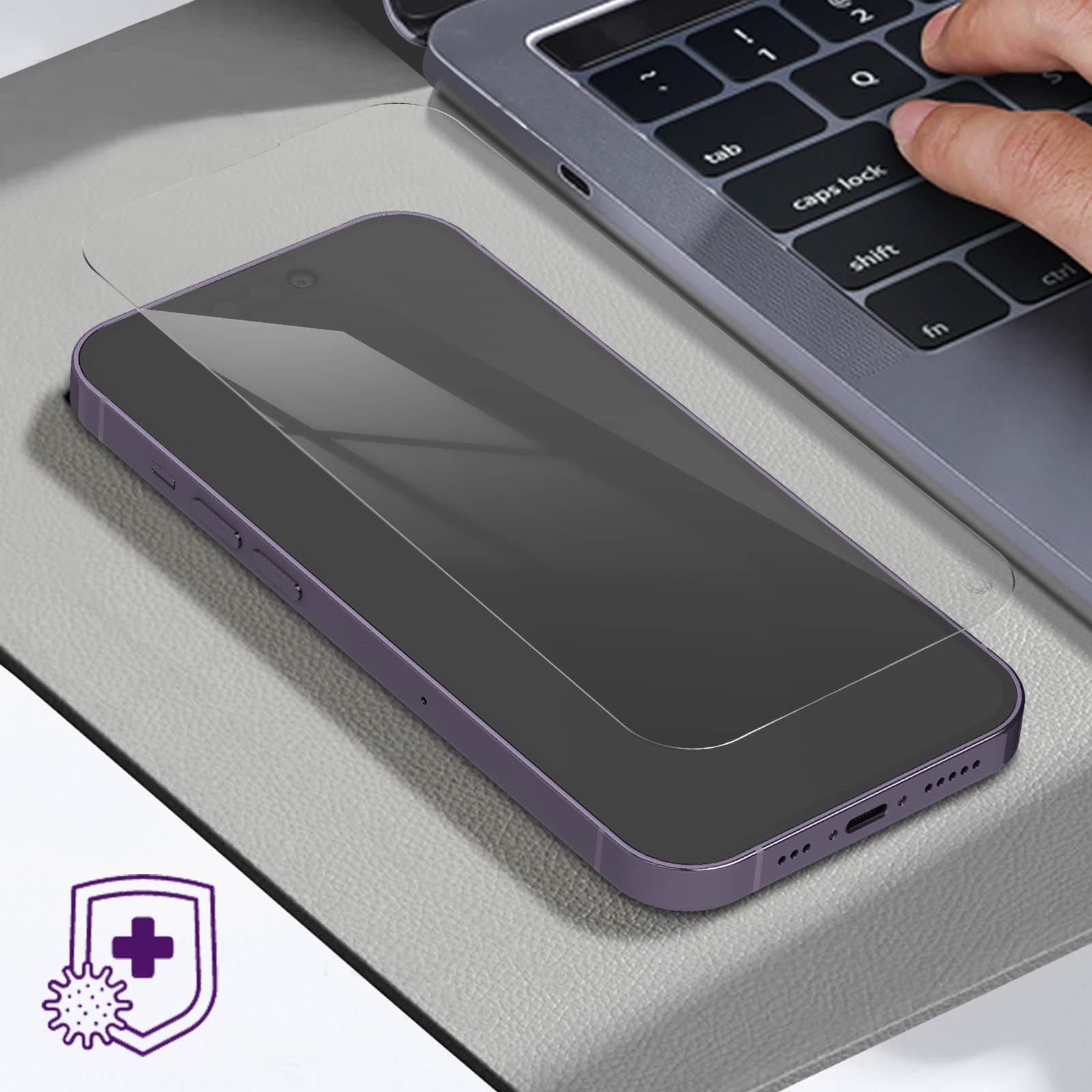 A phone on a surface with a protector and an anti-bacterial icon.