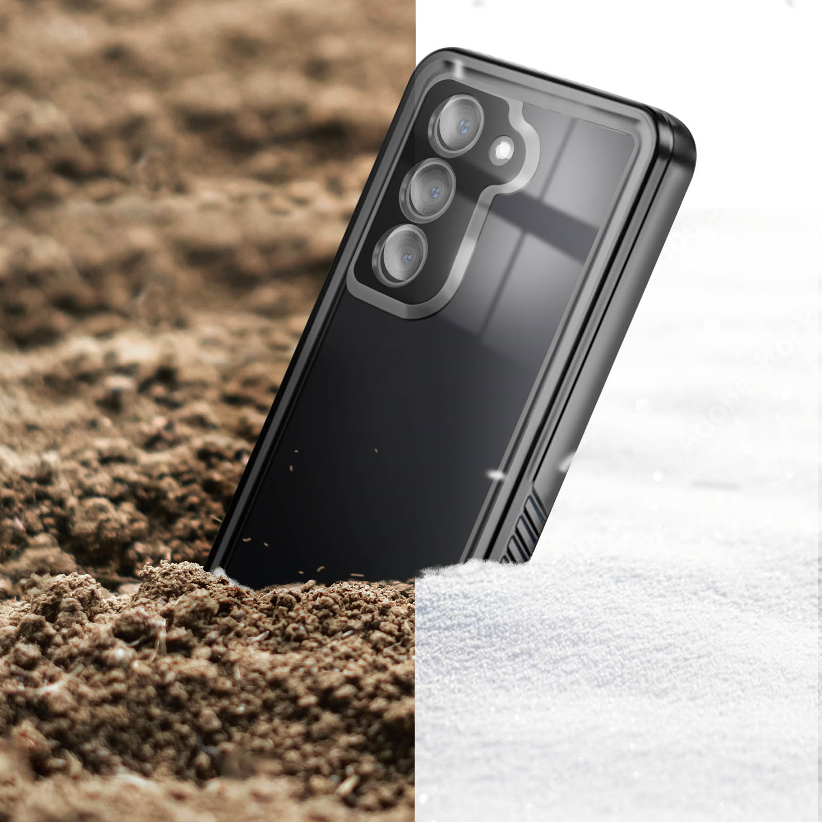 Telefono nero dentro una custodia, metà nella terra, metà nella neve. Ha più fotocamere.