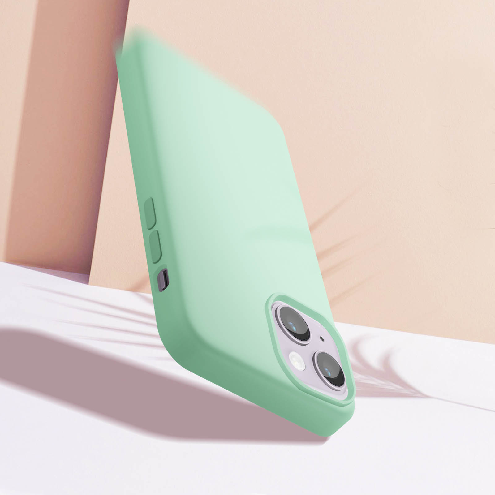 Een lichtgroene telefoonhoes. De telefoonhoes is iets schuin, waardoor de camera zichtbaar is.