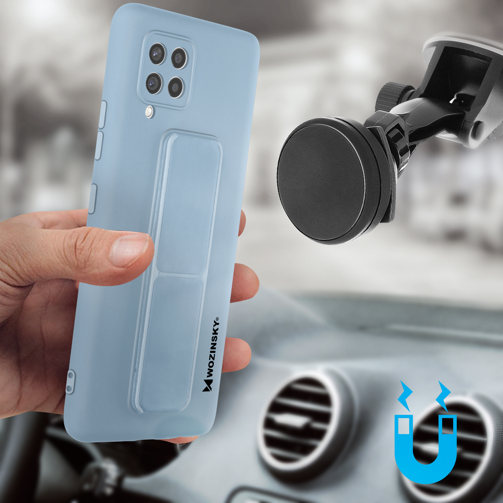 Dłoń trzyma jasnoniebieskie etui na telefon. Uchwyt samochodowy widoczny w tle.