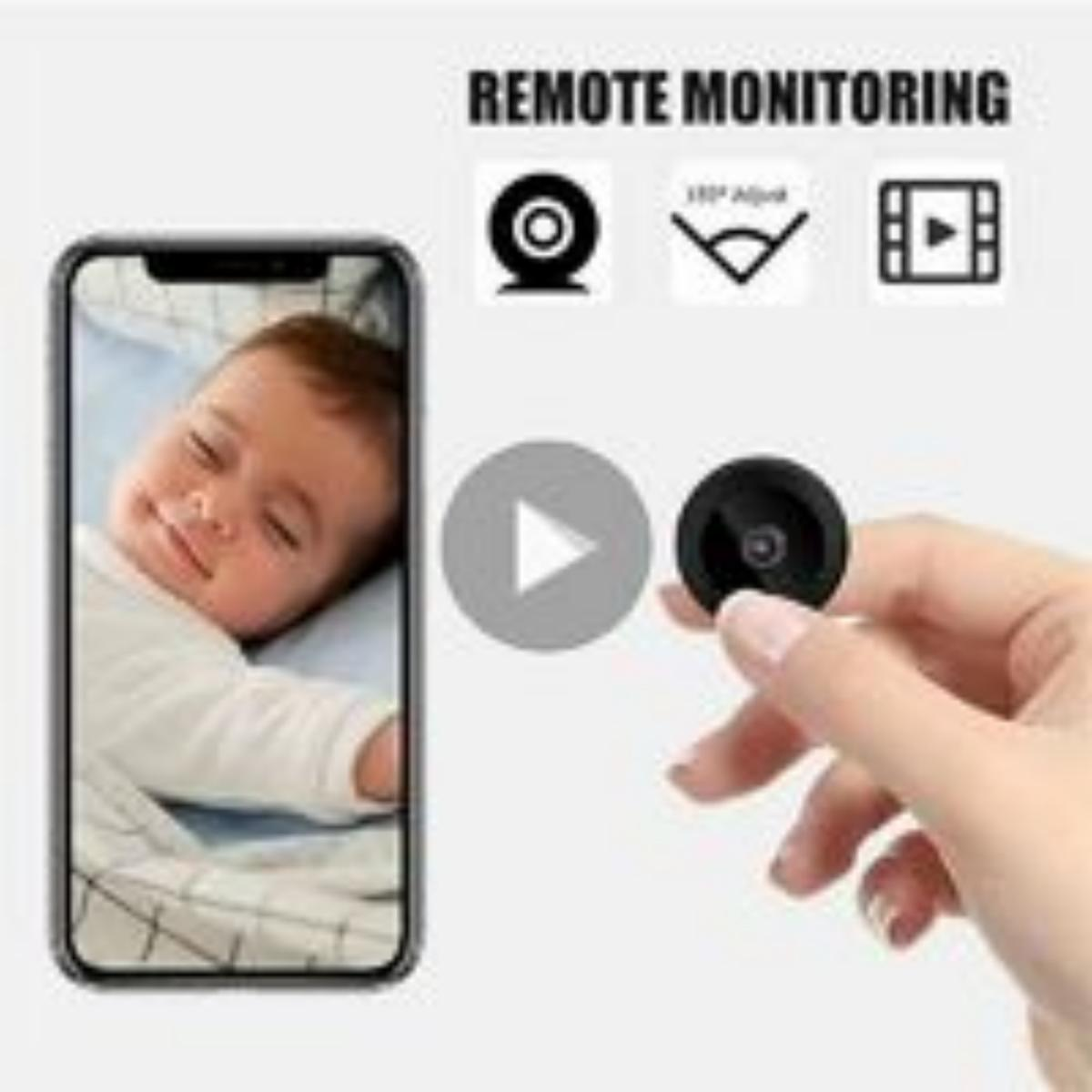 Ein Babyphone mit einem Bild eines Babys auf dem Bildschirm.