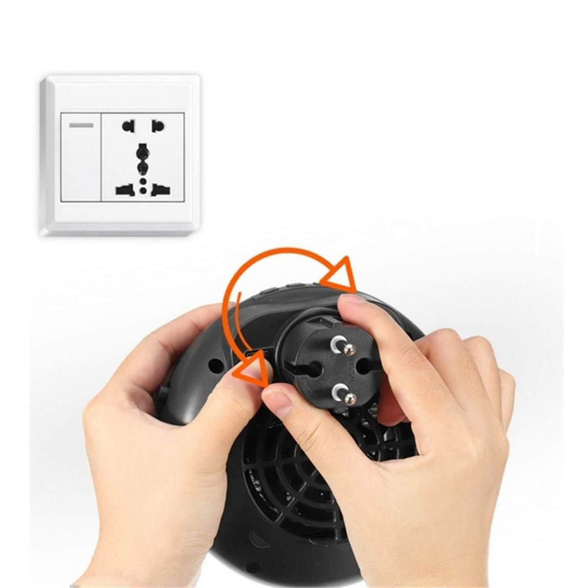 Manos conectando un enchufe a un dispositivo de calefacción cerca de un enchufe.