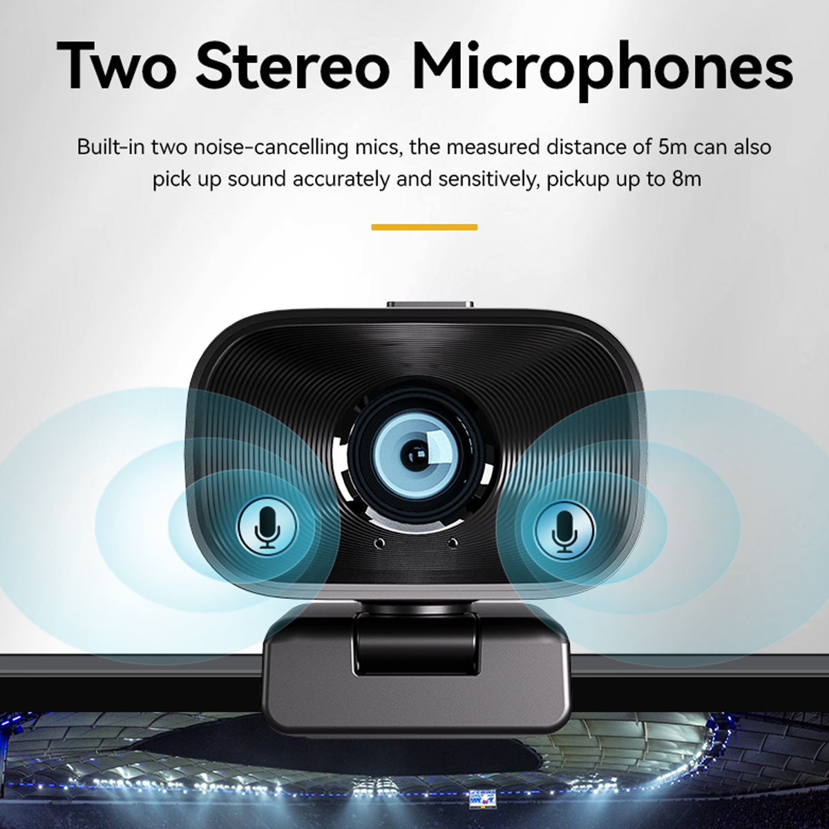 Schwarze Webcam mit zwei Mikrofonen auf einem Monitor. Text: 'Two Stereo Microphones'.