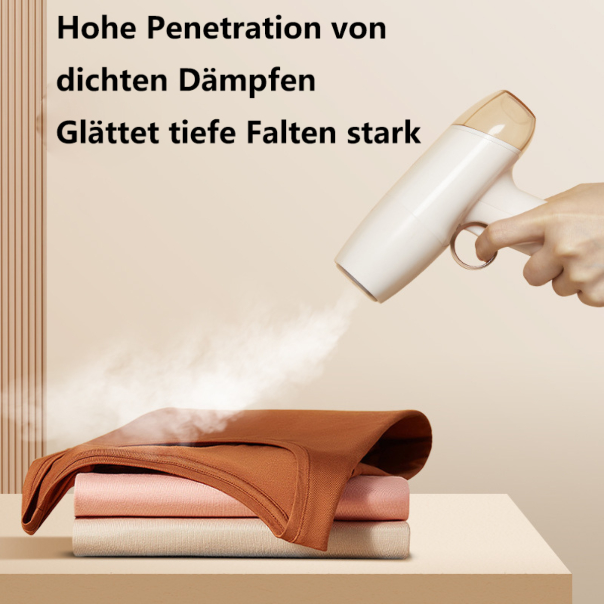 Handdampfer, der Kleidung bedampft. Text: Hohe Penetration dichter Dämpfe, glättet tiefe Falten stark.