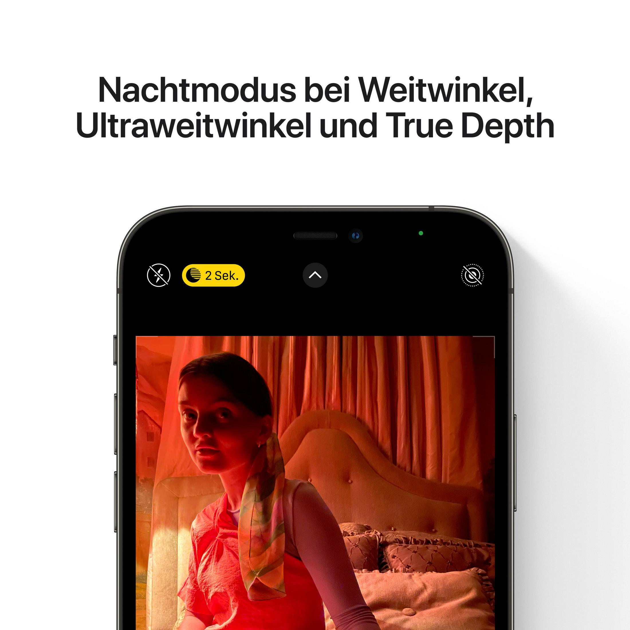 Ekran telefonu wyświetla kobietę w pokoju. Na górze napis: "Tryb nocny w szerokim kącie".