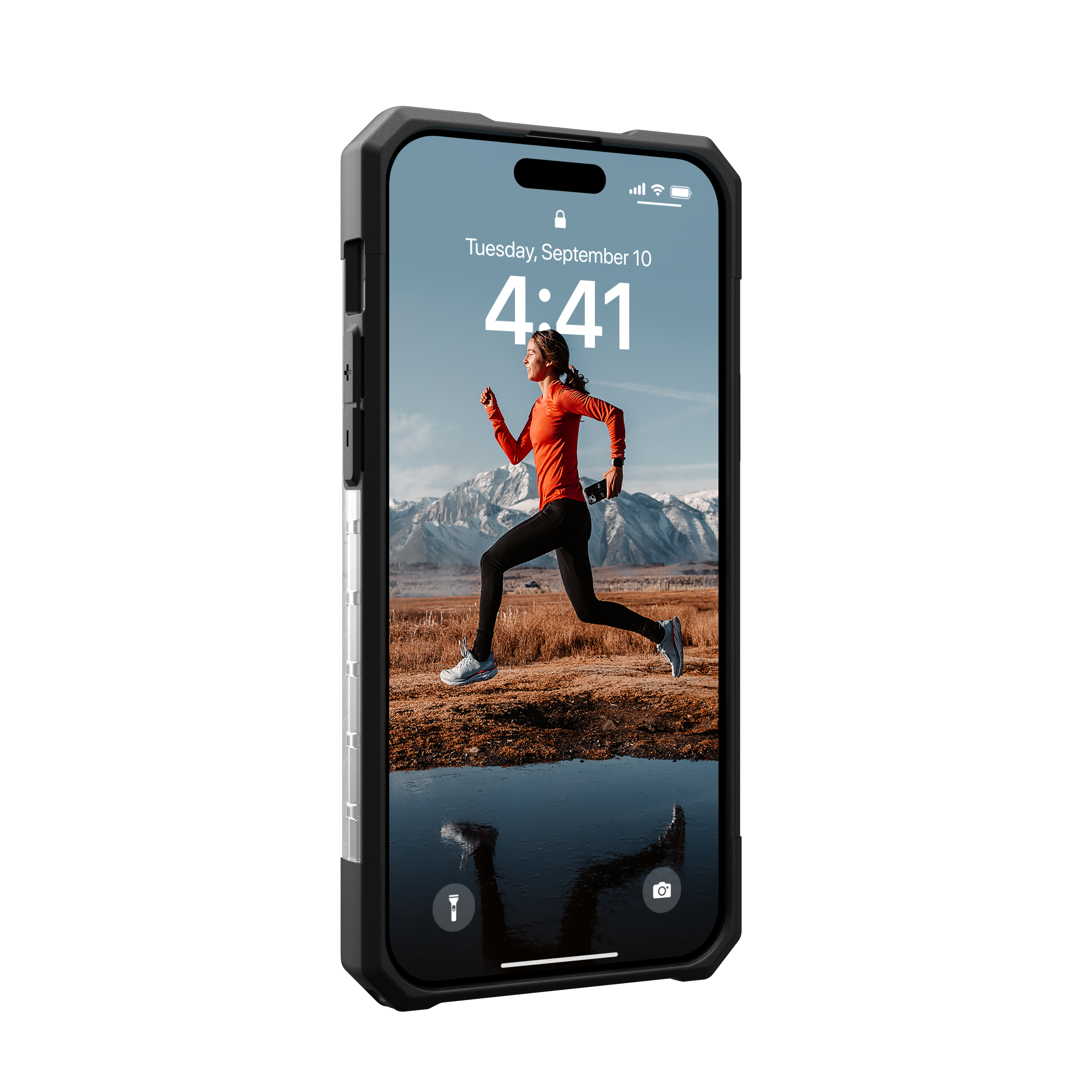 Telefono nella custodia, mostra una donna che corre con montagne sullo sfondo, ora 4:41.