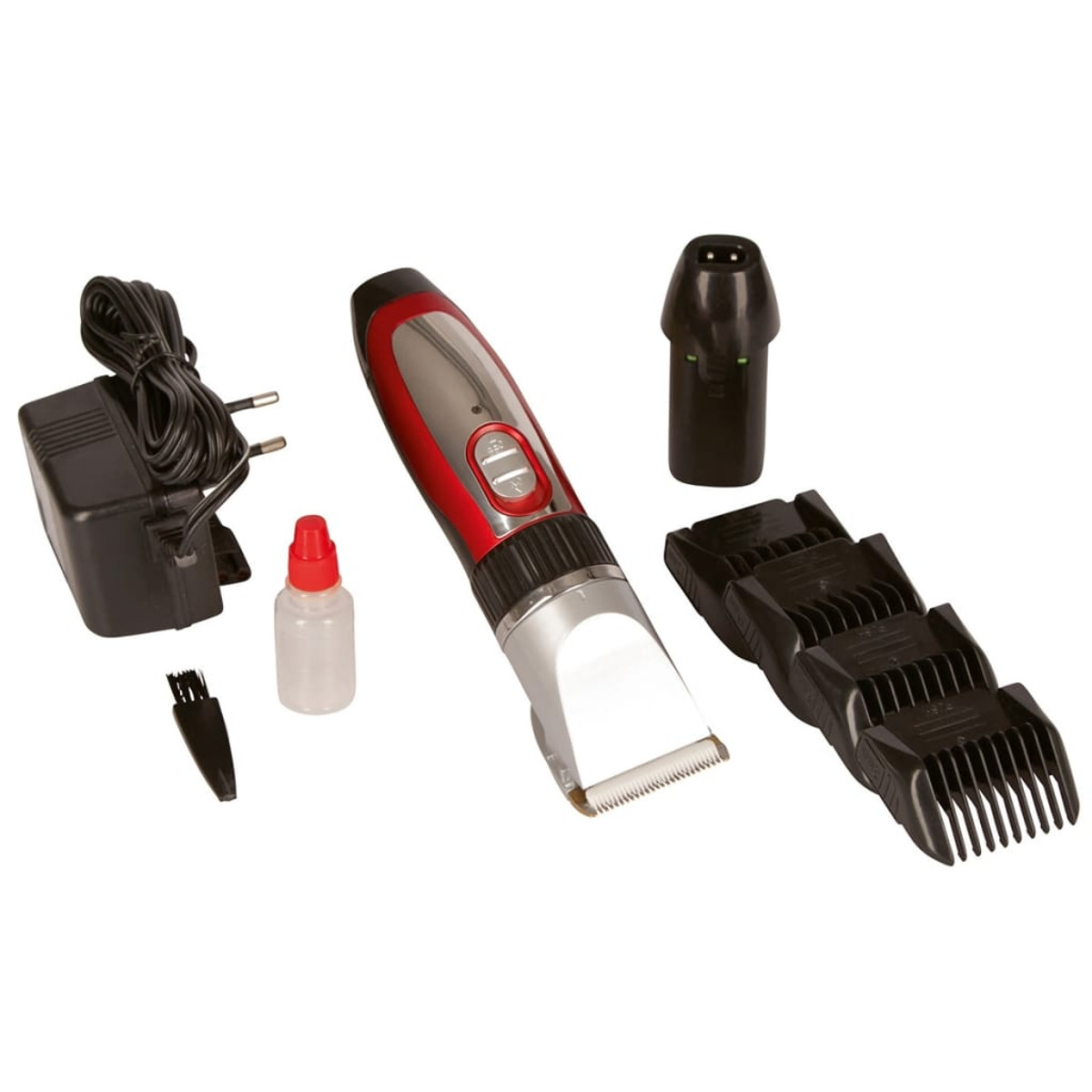 Tagliacapelli e accessori su sfondo bianco. Include olio, spazzola e pettini.
