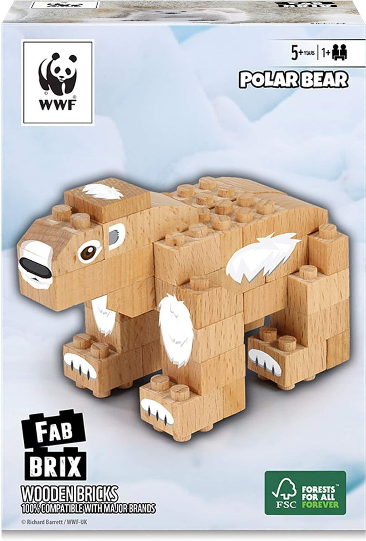 Ein Eisbär aus Holzbausteinen und eine Box mit einem Eisbären und 'FAB BRIX'.