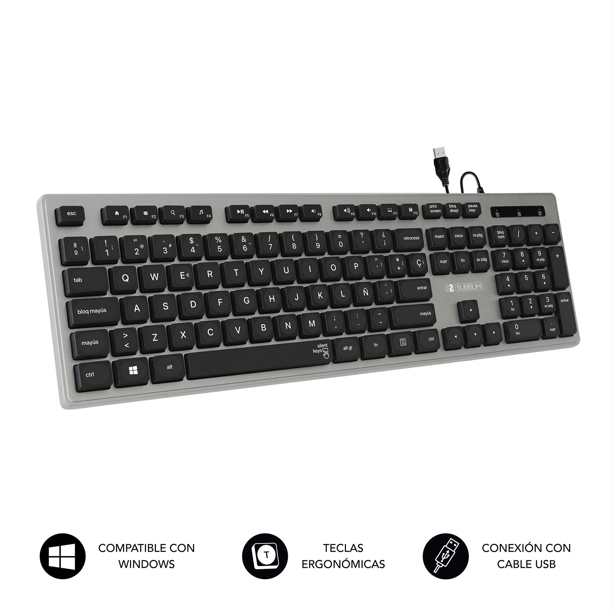 Teclado gris con teclas negras. Cable USB conectado. Iconos debajo del teclado.