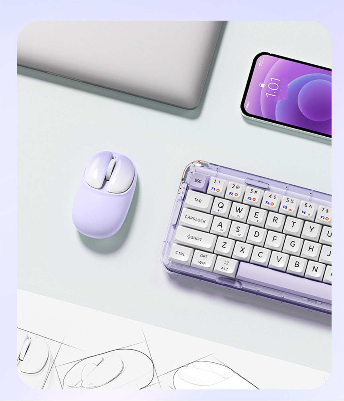 Eine lilafarbene Computermaus, Tastatur, Laptop und Telefon auf einer hellgrünen und lila Oberfläche.