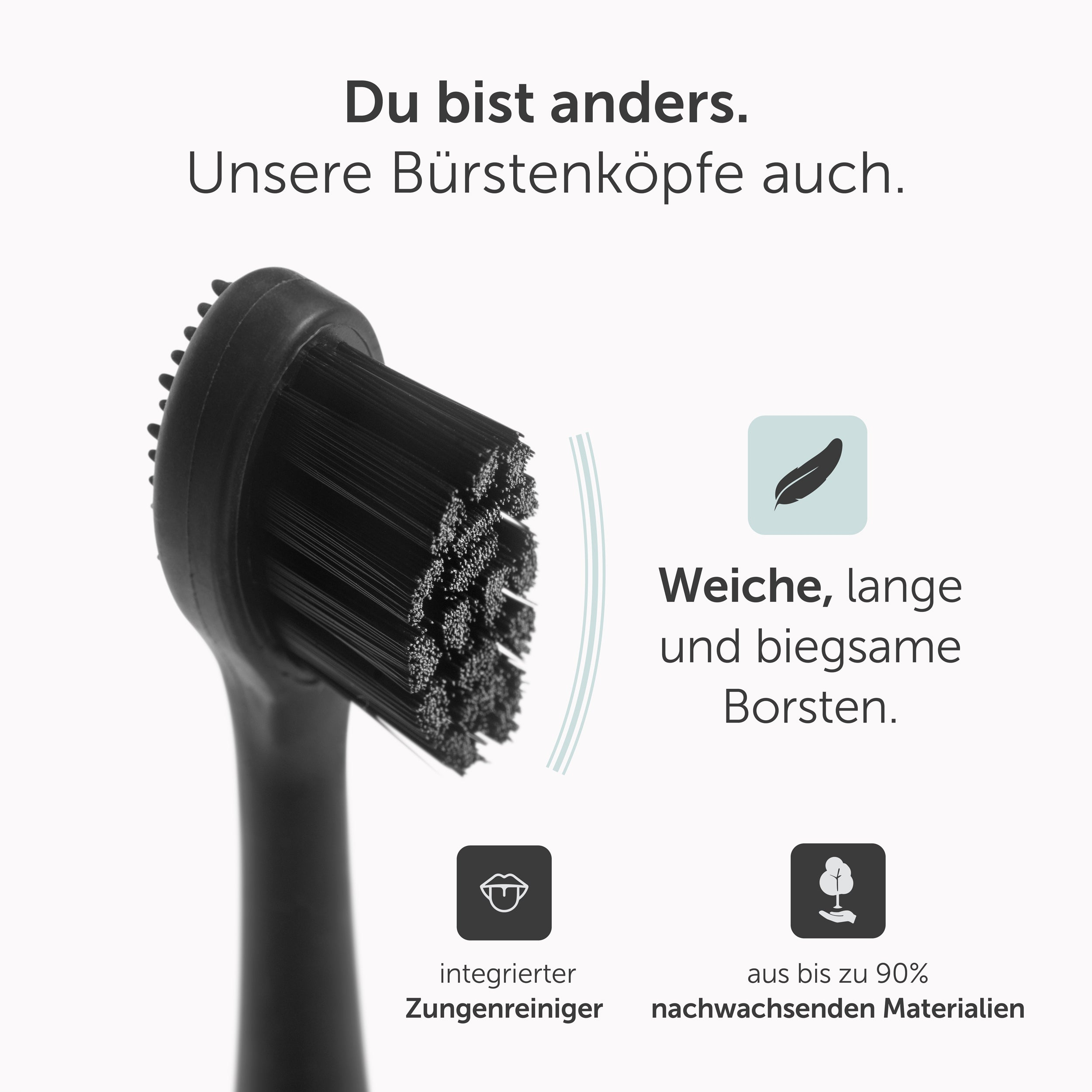 Schwarzer Zahnbürstenkopf mit schwarzen Borsten. Text auf Deutsch. Zungenreiniger und recyceltes Material.