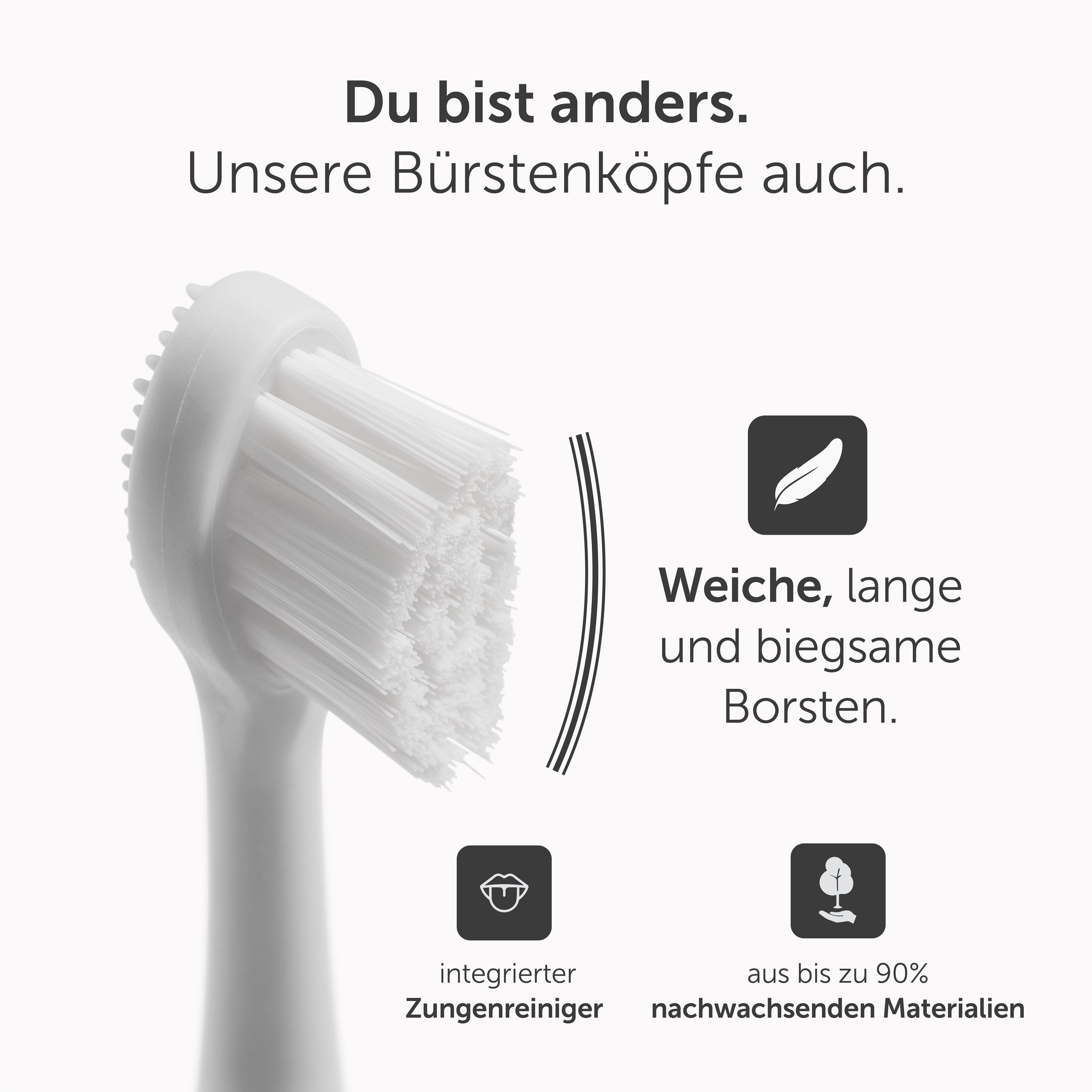 Nahaufnahme eines weißen Zahnbürstenkopfes mit Text: Weiche, lange und flexible Borsten, Zungenreiniger.