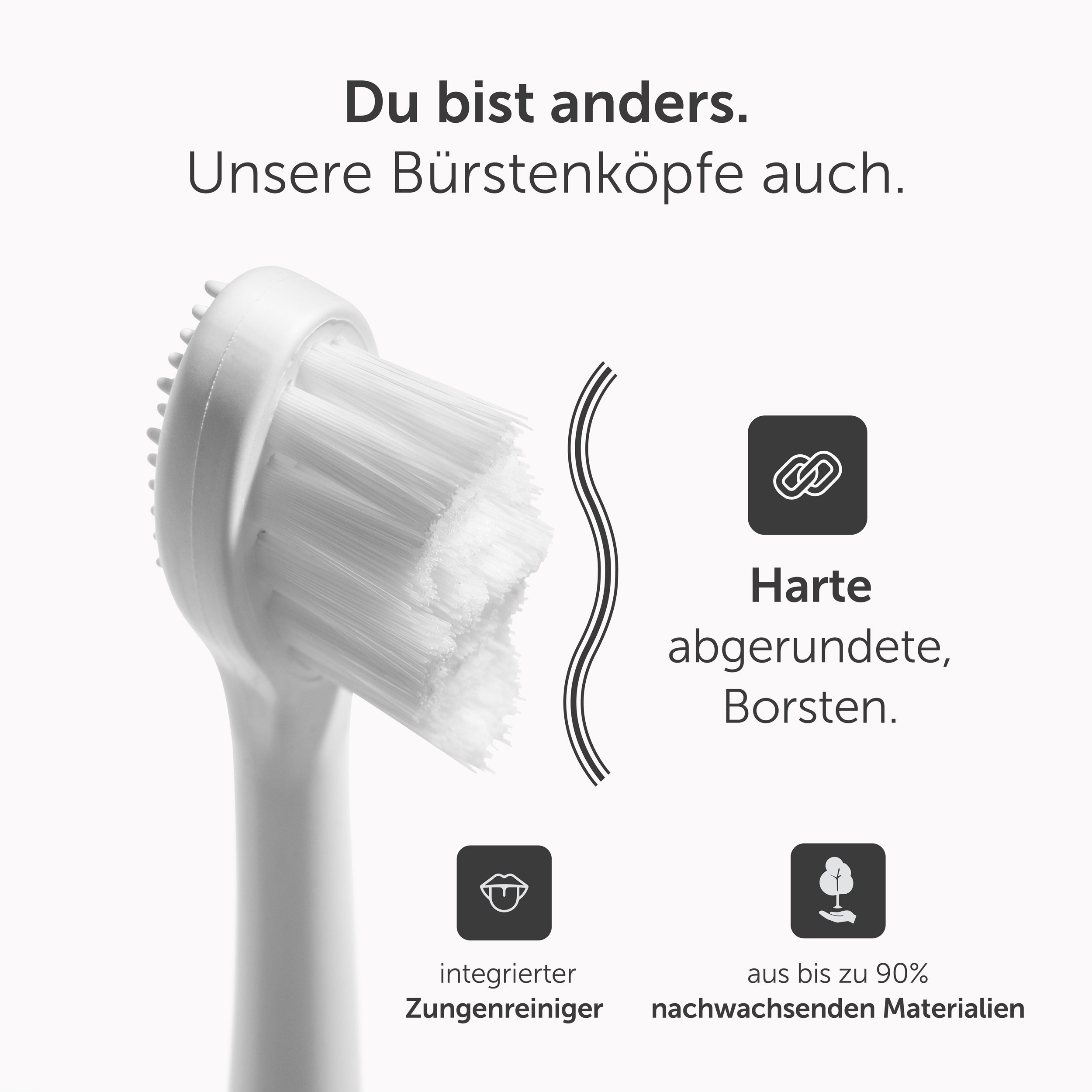 Nahaufnahme eines Zahnbürstenkopfes. Mit weißen Borsten und einem integrierten Zungenreiniger.