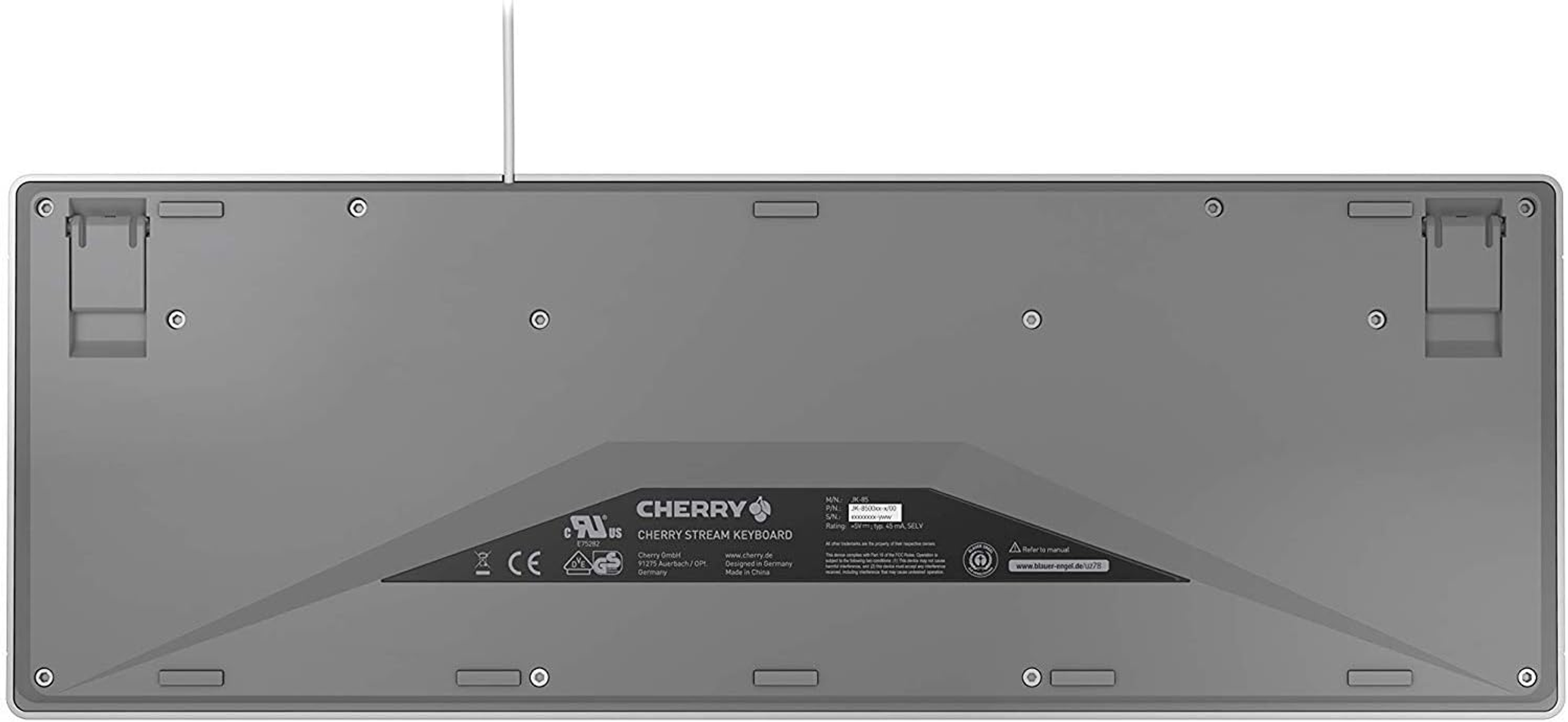 Fondo di una tastiera Cherry Stream grigia con etichette e testo Cherry Stream Keyboard visibile.
