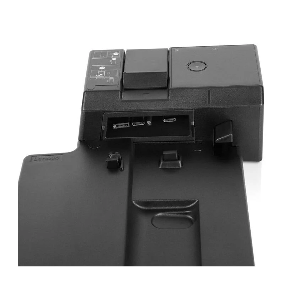Eine schwarze Dockingstation mit mehreren Anschlüssen und einem Lenovo-Logo. Der Hintergrund ist weiß.