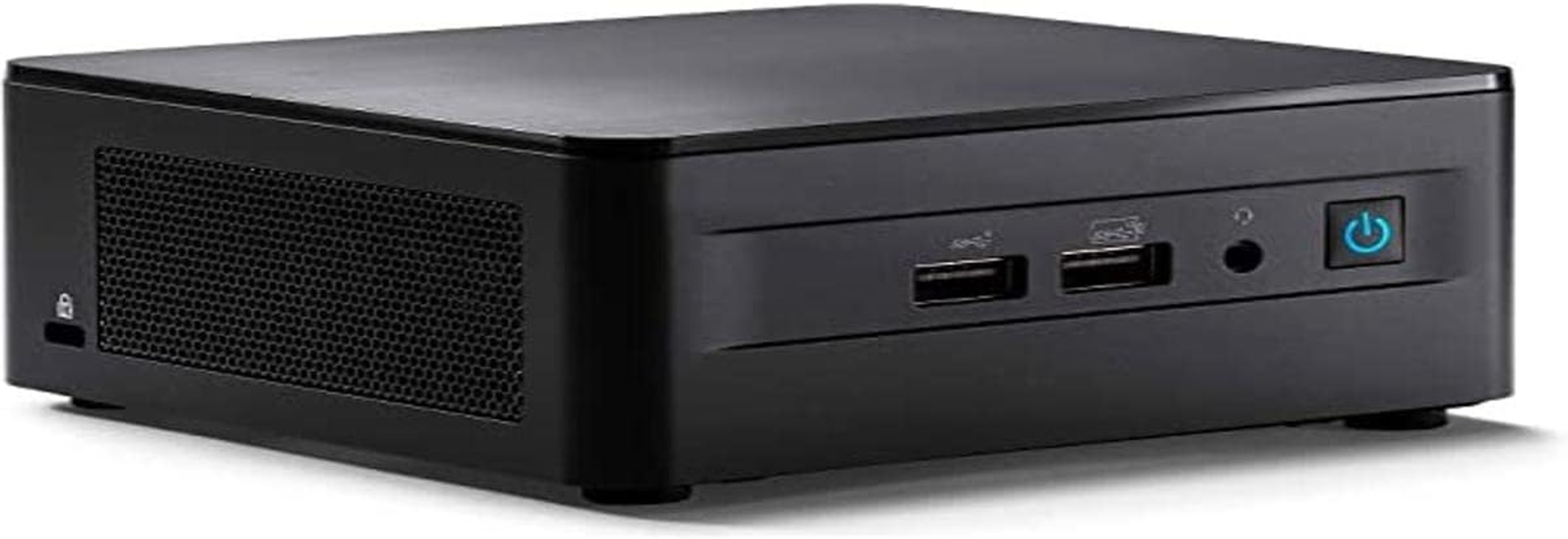Mini computer nero. Due porte USB, jack audio e pulsante di accensione. Griglia di ventilazione.