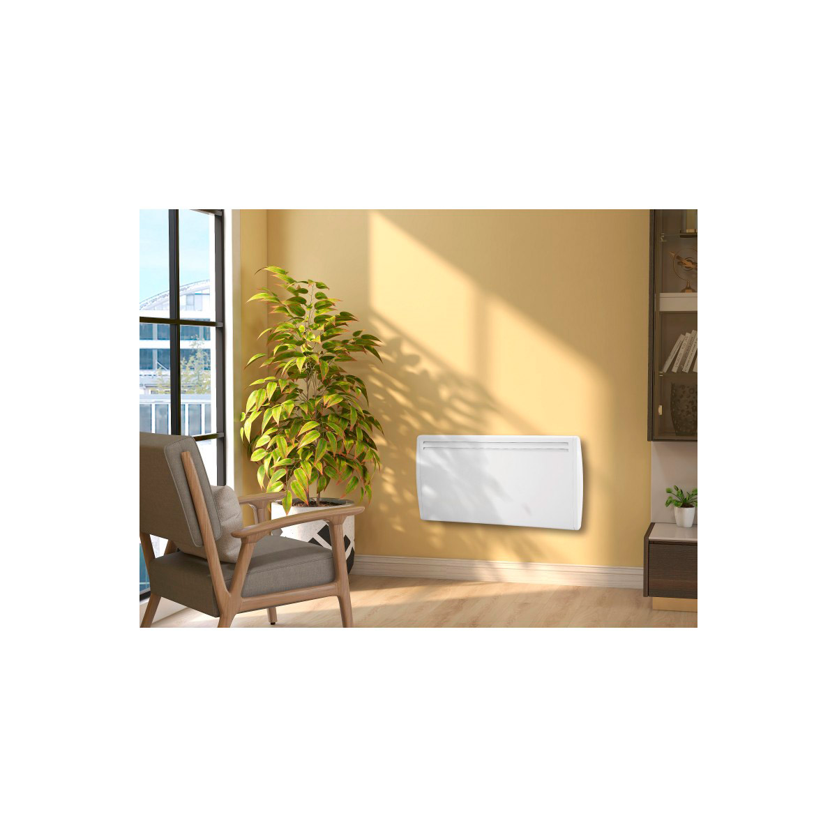 Un calentador eléctrico blanco montado en una pared amarilla. Una planta está al lado del calentador.