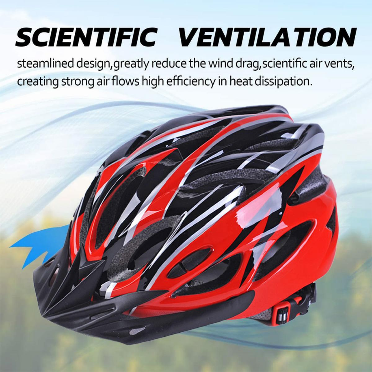 Roter und schwarzer Fahrradhelm mit Belüftungsschlitzen und Visier, vor verschwommenem Parkhintergrund.