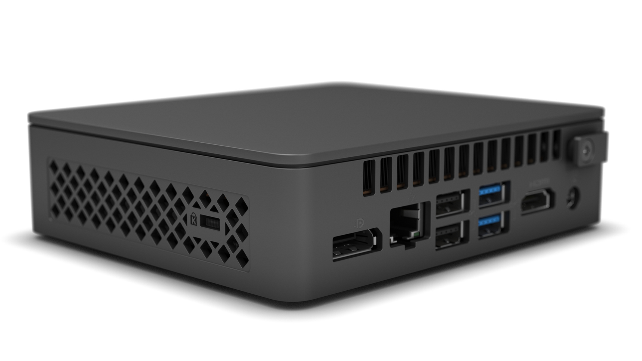 Ein schwarzer Computer mit Anschlüssen auf der Rückseite und Seite steht auf weißer Oberfläche.