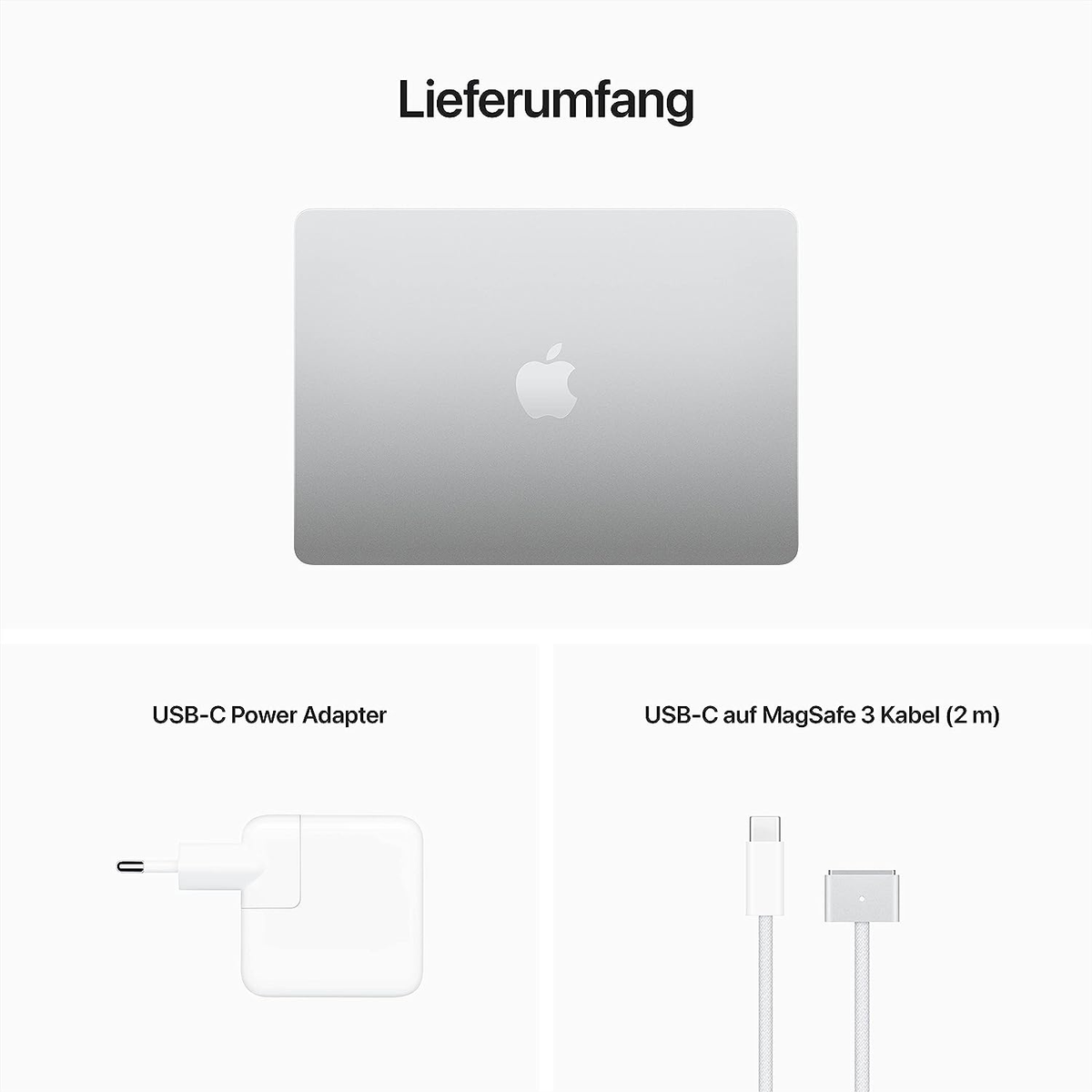 Ein silberner Laptop, ein Netzteil und ein Kabel vor weißem Hintergrund.
