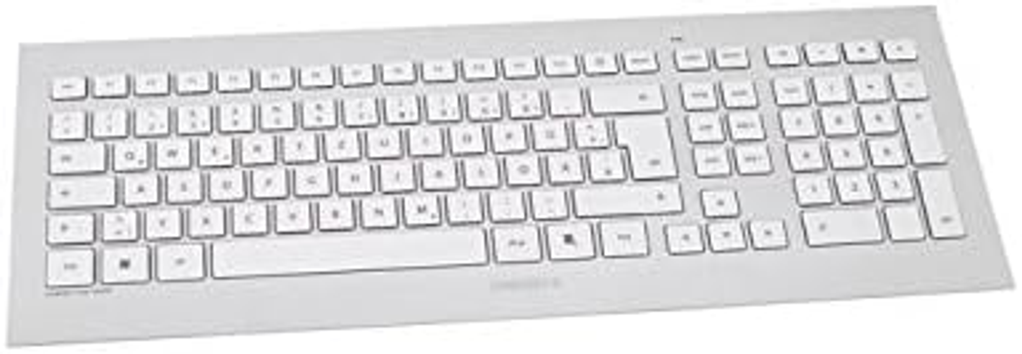 Tastiera argentata con tasti bianchi. Il layout include lettere, numeri e simboli. Sfondo bianco.
