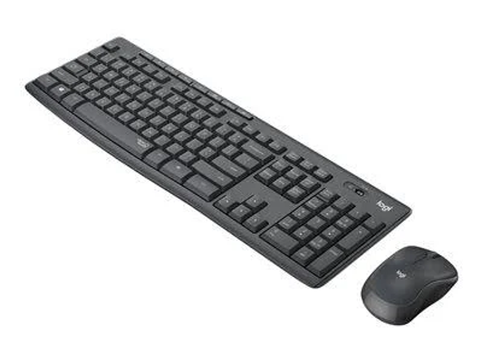 Conjunto de teclado y ratón negros sobre superficie blanca. El teclado tiene muchas teclas.